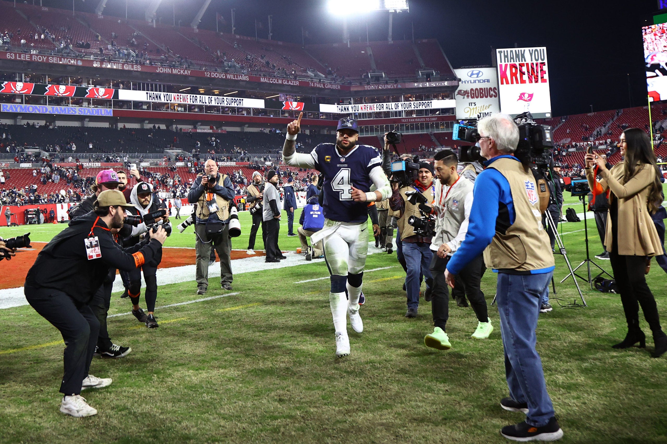Jan 16, 2023; Tampa, Florida, USA; Dallas Cowboys quarterback Dak Prescott (4) runs off the field after the wild card game against the Tampa Bay Buccaneers at Raymond James Stadium. Mandatory Credit: Kim Klement-USA TODAY Sports