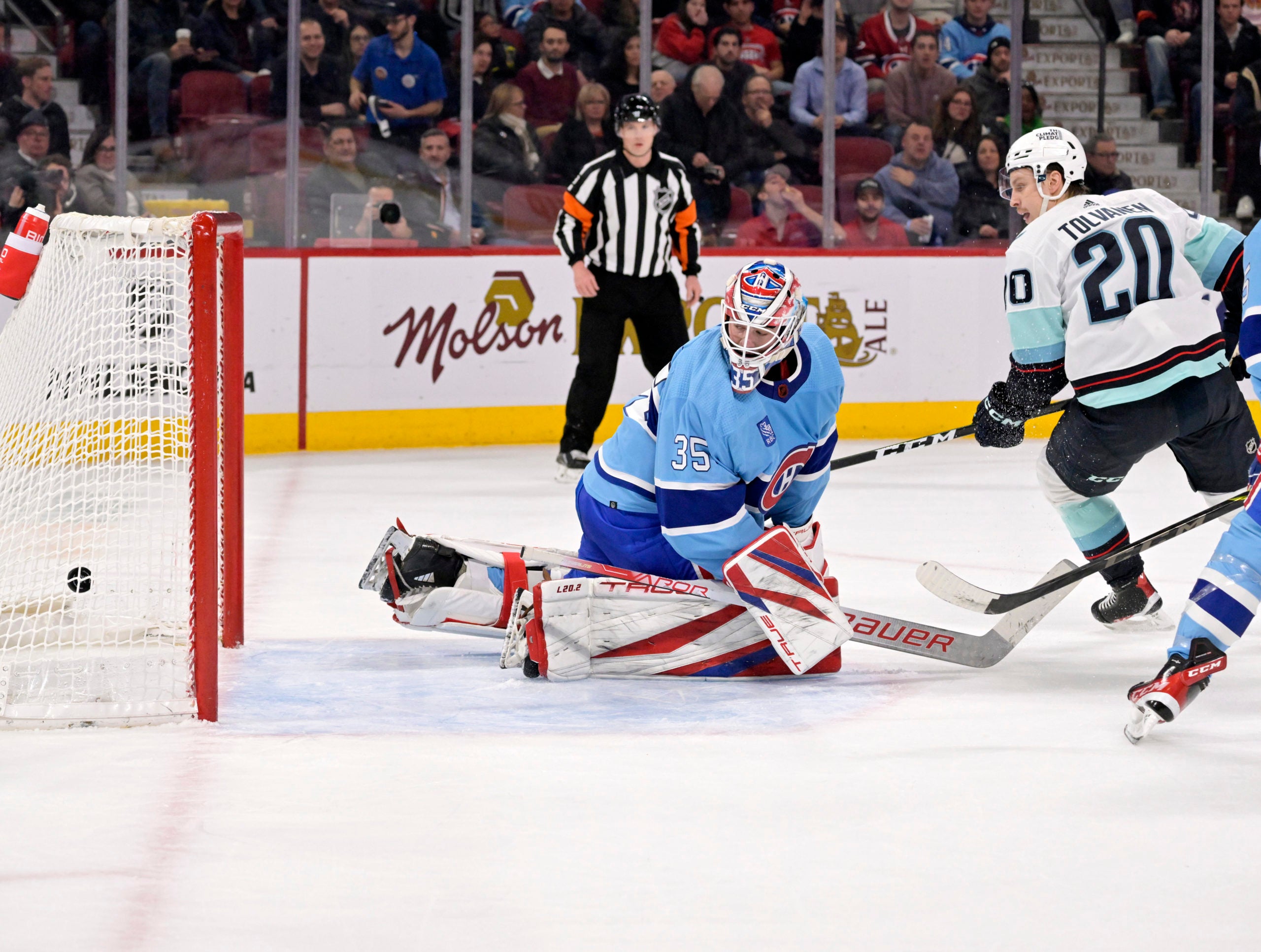 Eeli Tolvanen, formerly of the Nashville Predators until he was waived by GM David Poile, scores a goal with his new team the Seattle Kraken.