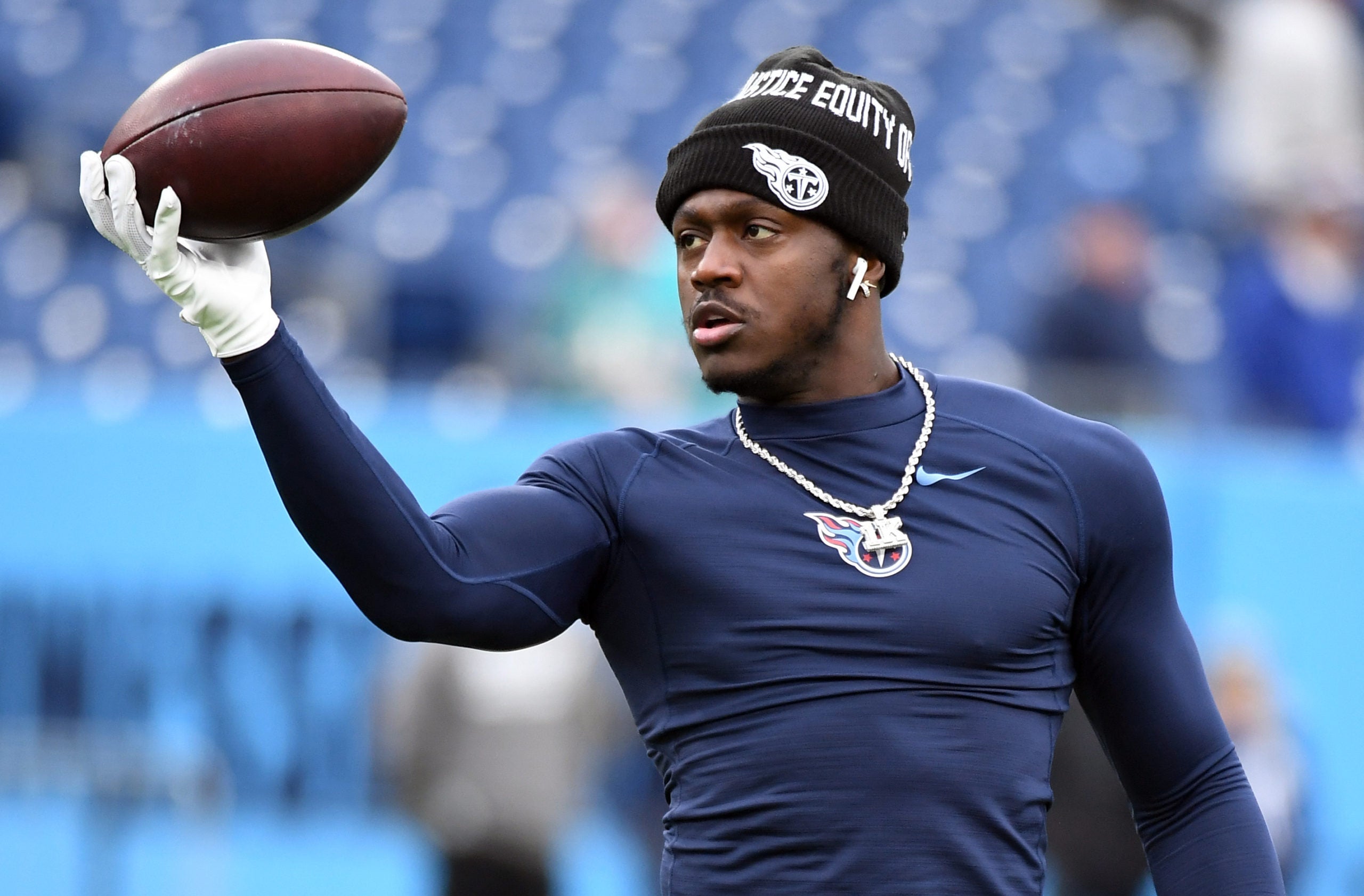 Jan 2, 2022; Nashville, Tennessee, USA; Tennessee Titans wide receiver A.J. Brown (11) warms up before the game against the Miami Dolphins at Nissan Stadium. Mandatory Credit: Christopher Hanewinckel-USA TODAY Sports