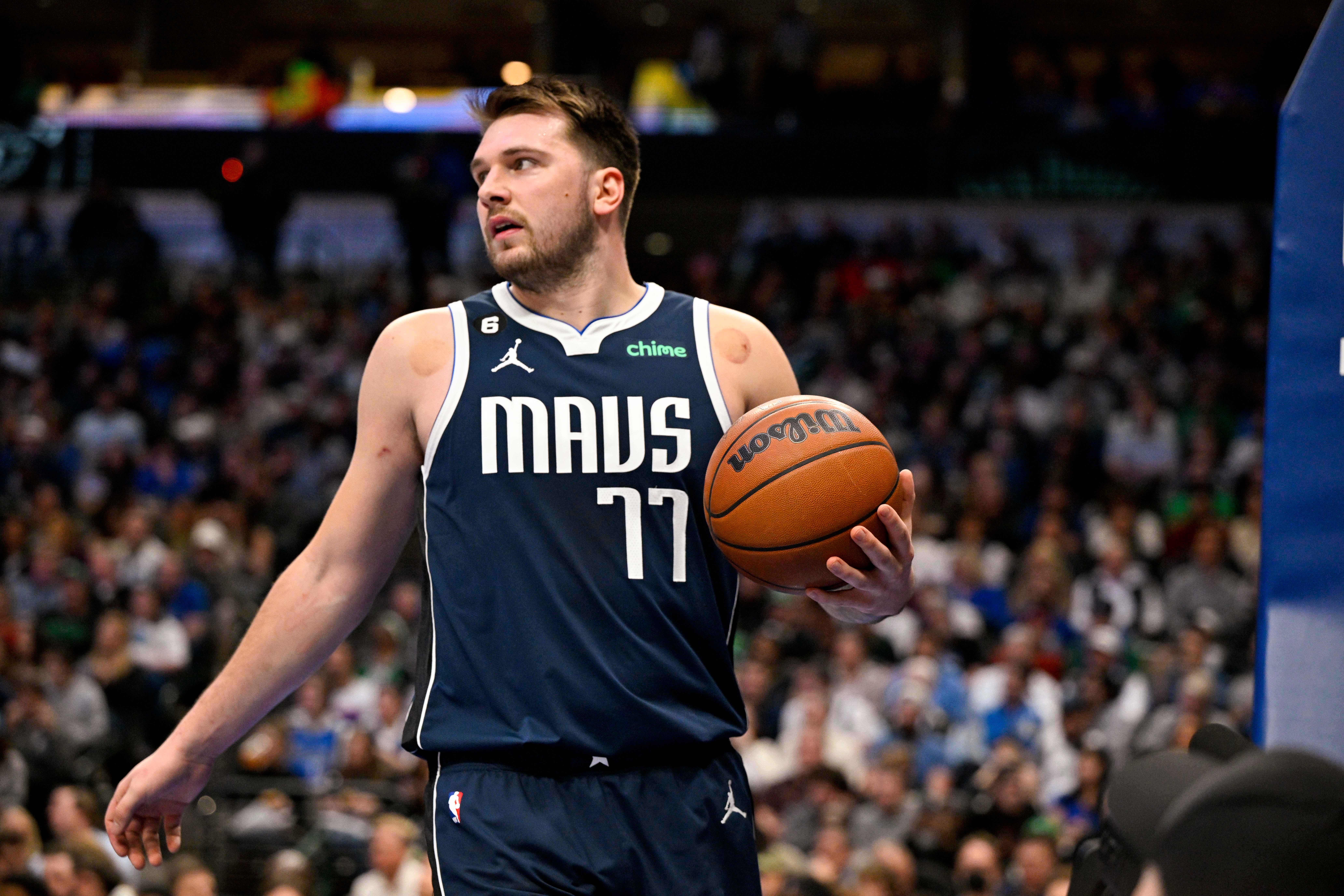 Luka Doncic looks over his shoulder.