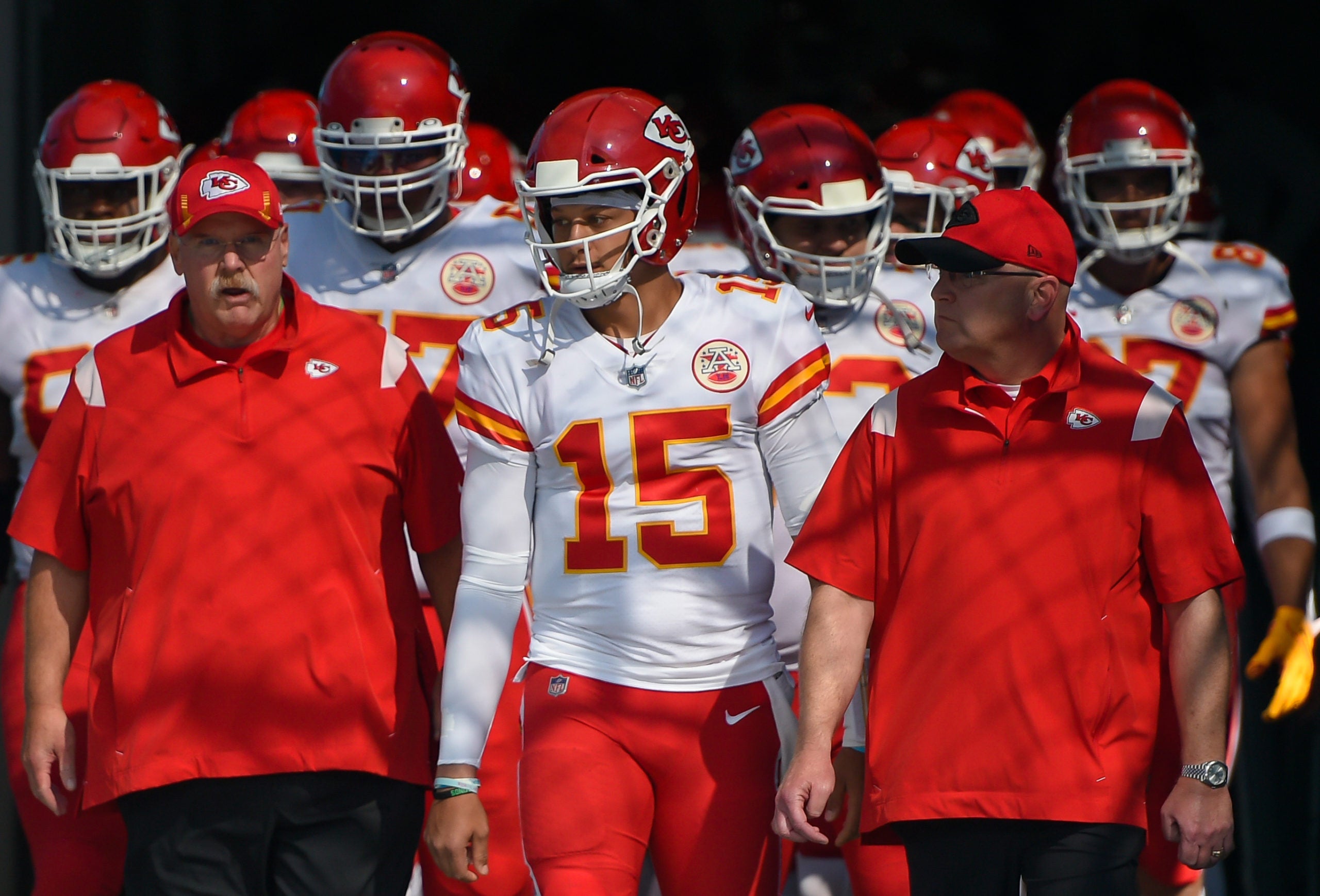 Chiefs quarterback Patrick Mahomes (15) stands with Kansas City Chiefs head coach Andy Reid just prior to taking the field against the Titans.