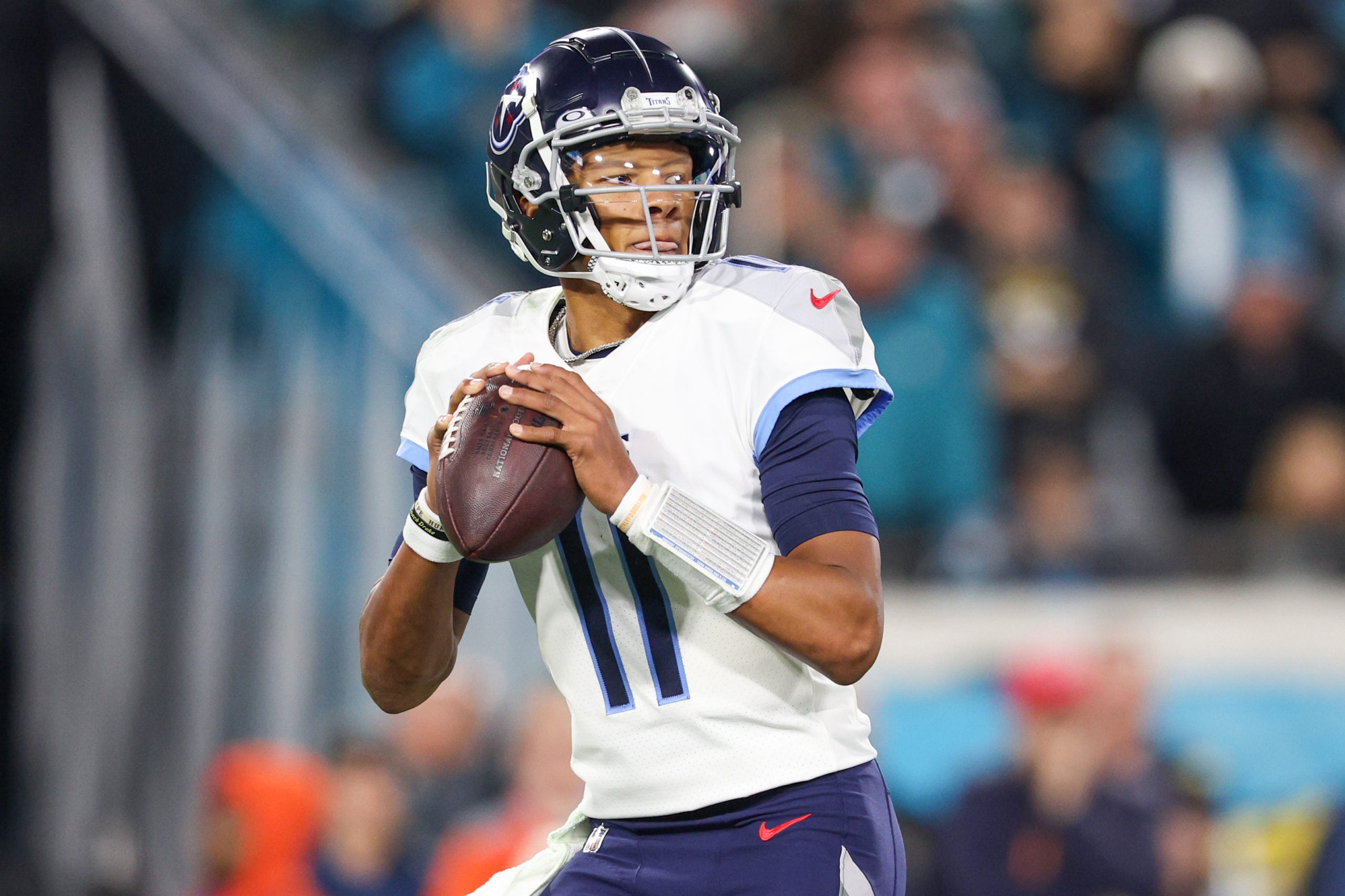 Jan 7, 2023; Jacksonville, Florida, USA;  Tennessee Titans quarterback Joshua Dobbs (11) drops back to pass against the Jacksonville Jaguars in the second quarter at TIAA Bank Field. Mandatory Credit: Nathan Ray Seebeck-USA TODAY Sports