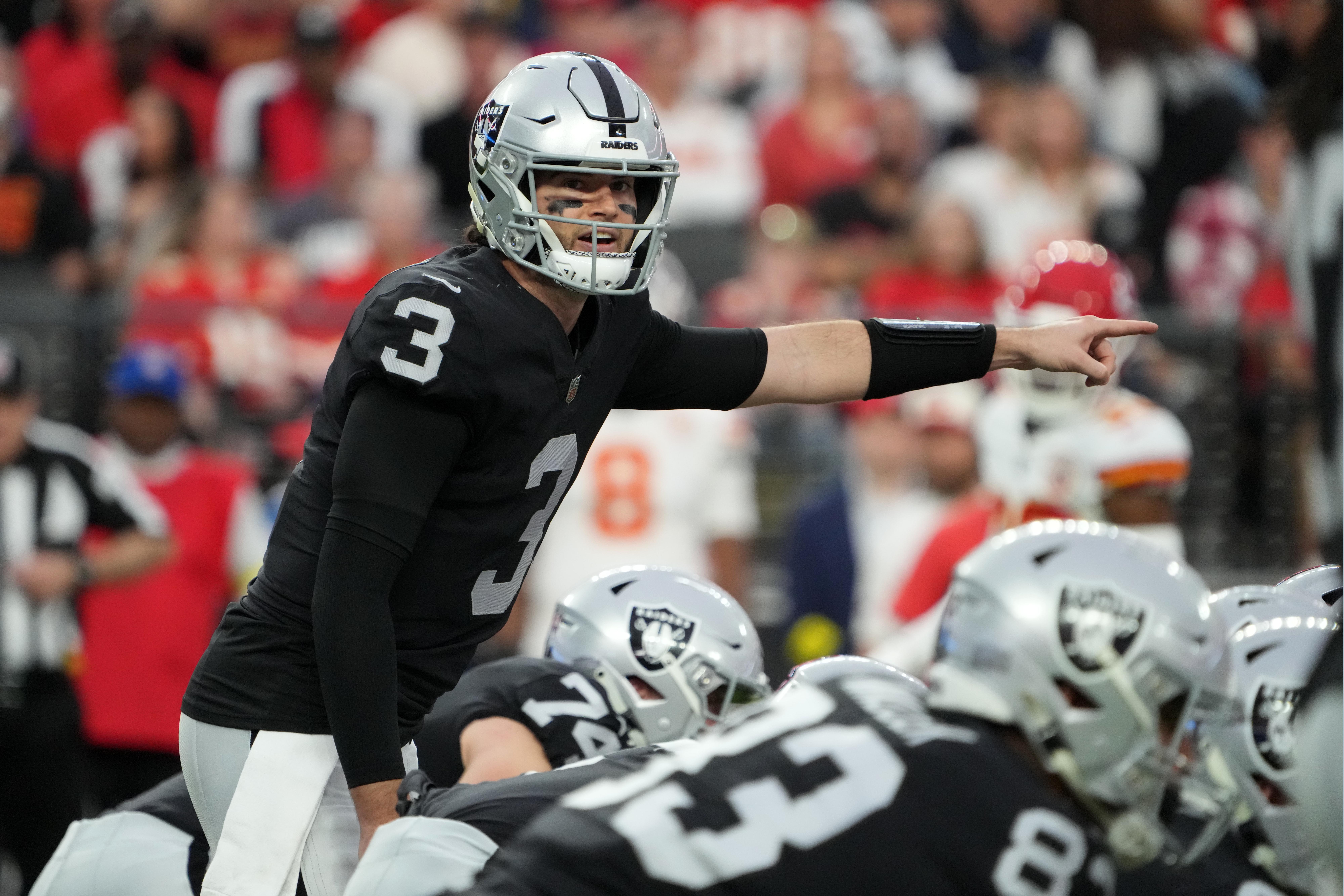 Paradise, Nevada, USA; Las Vegas Raiders quarterback Jarrett Stidham (3) gestures against the Kansas City Chiefs in the first half at Allegiant Stadium.