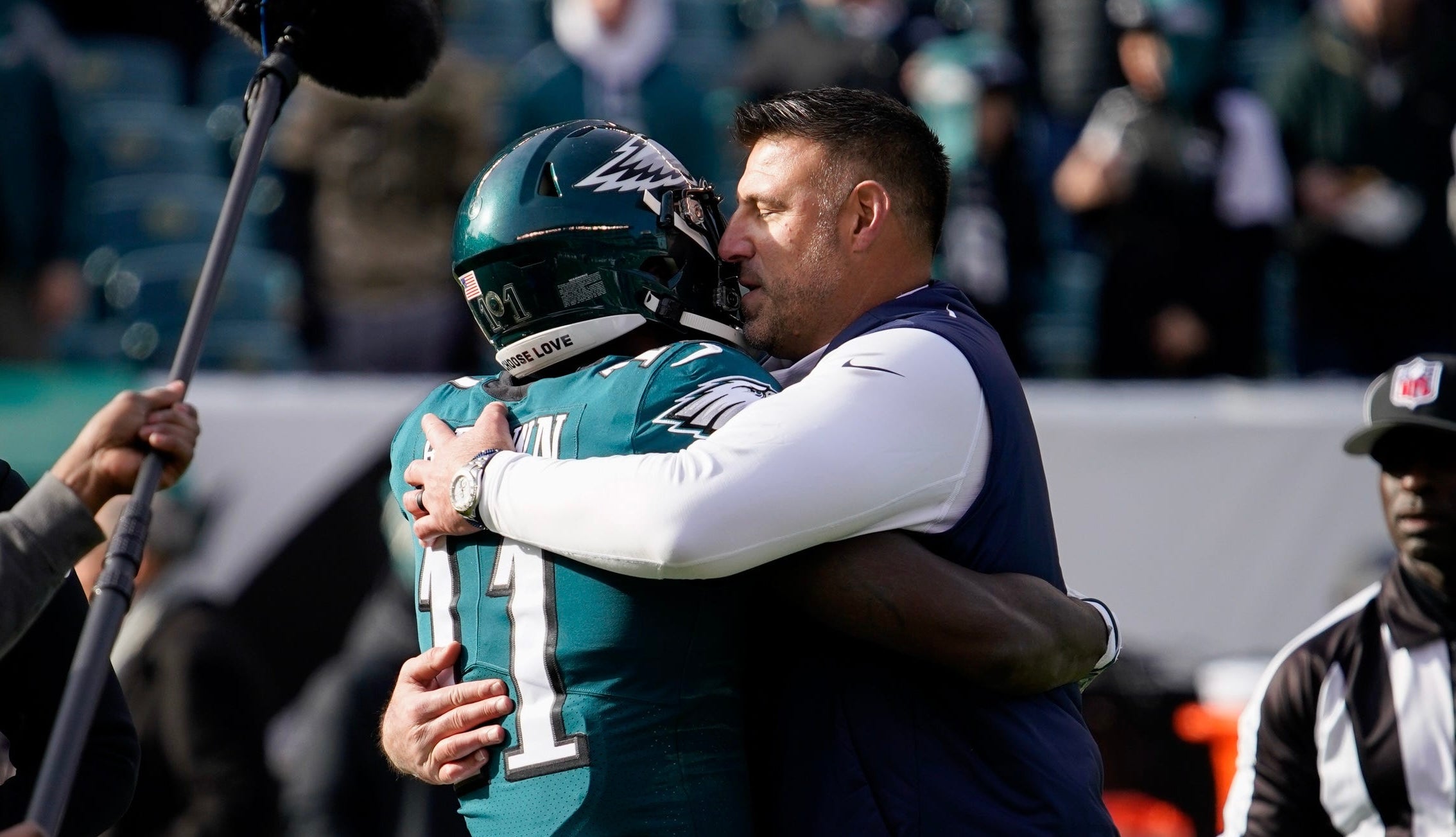 Tennessee Titans head coach Mike Vrabel hugs Philadelphia Eagles wide receiver A.J. Brown (11) as the teams get ready to face off at Lincoln Financial Field Sunday, Dec. 4, 2022, in Philadelphia, Pa. Nfl Tennessee Titans At Philadelphia Eagles