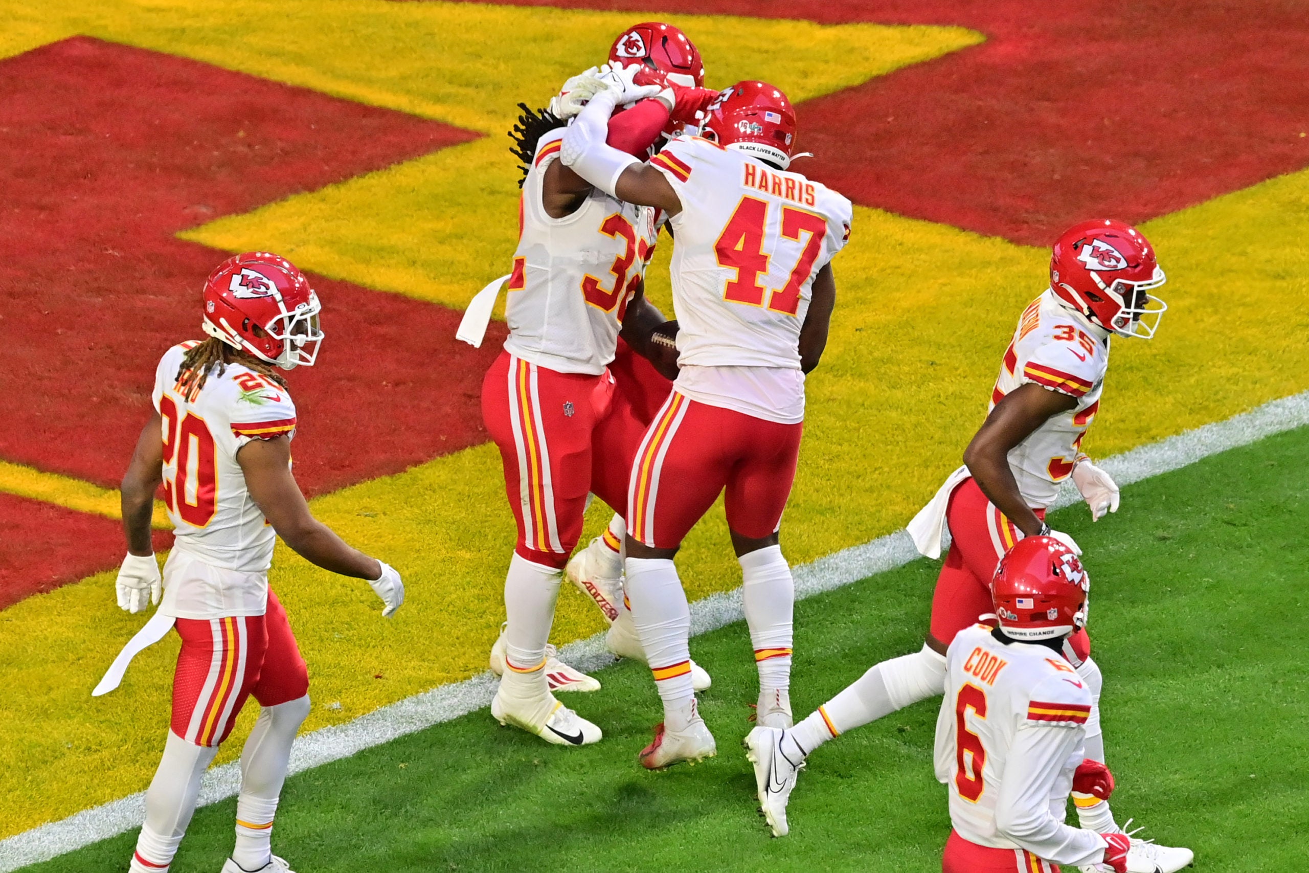 Feb 12, 2023; Glendale, Arizona, US; Kansas City Chiefs linebacker Nick Bolton (32) celebrates with teammates after returning a fumble for a touchdown against the Philadelphia Eagles during the second quarter of Super Bowl LVII at State Farm Stadium. Mandatory Credit: Matt Kartozian-USA TODAY Sports