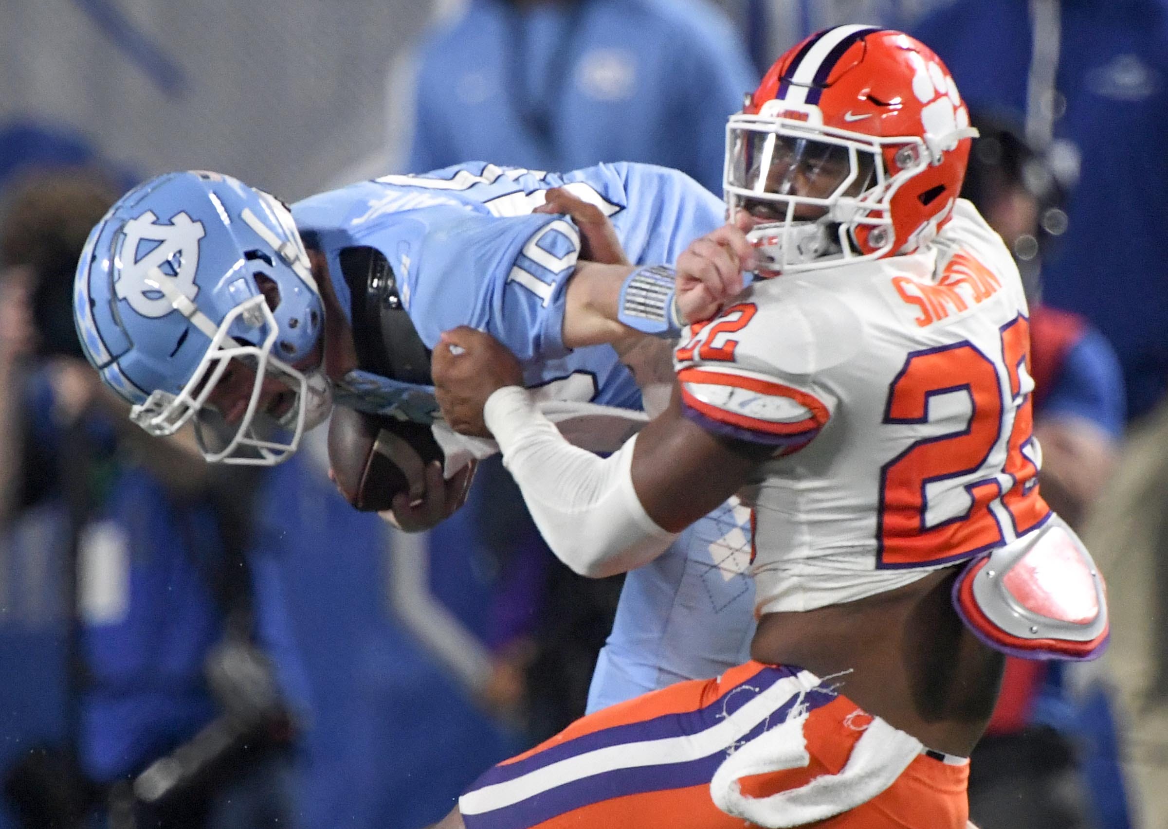 Clemson linebacker Trenton Simpson (22) tackles North Carolina quarterback Drake Maye (10) during the second quarter of the ACC Championship football game at Bank of America Stadium in Charlotte, North Carolina Saturday, Dec 3, 2022. Clemson Tigers Football Vs North Carolina Tar Heels Acc Championship Charlotte Nc