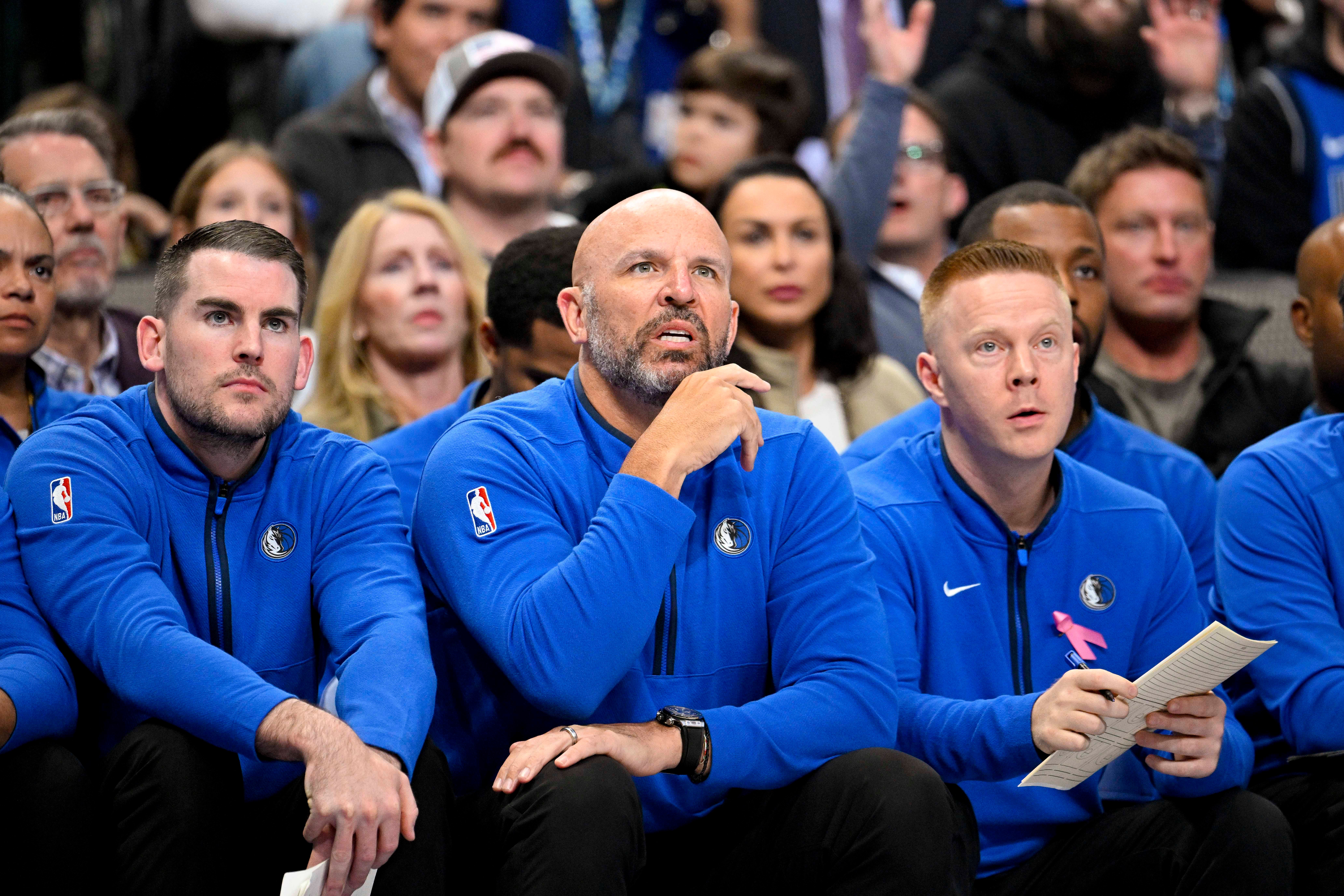 USA; Dallas Mavericks head coach Jason Kidd (center) watches his team take of the San Antonio Spurs during the first quarter at the American Airlines Center.