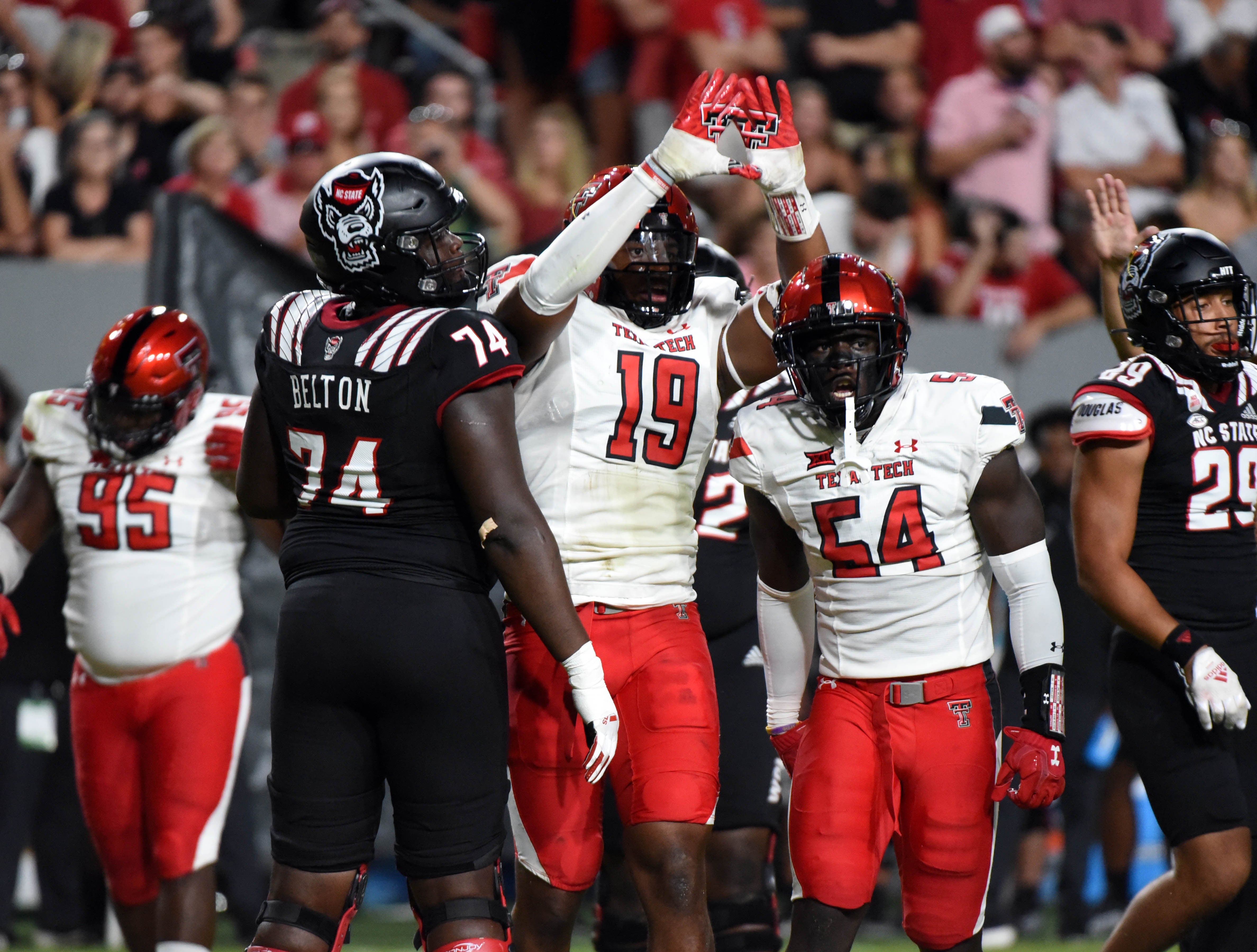 Raleigh, North Carolina, USA; Texas Tech Red Raiders linebacker Tyree Wilson (19) reacts after a sack during the first half against the Texas Tech Red Raiders at Carter-Finley Stadium.