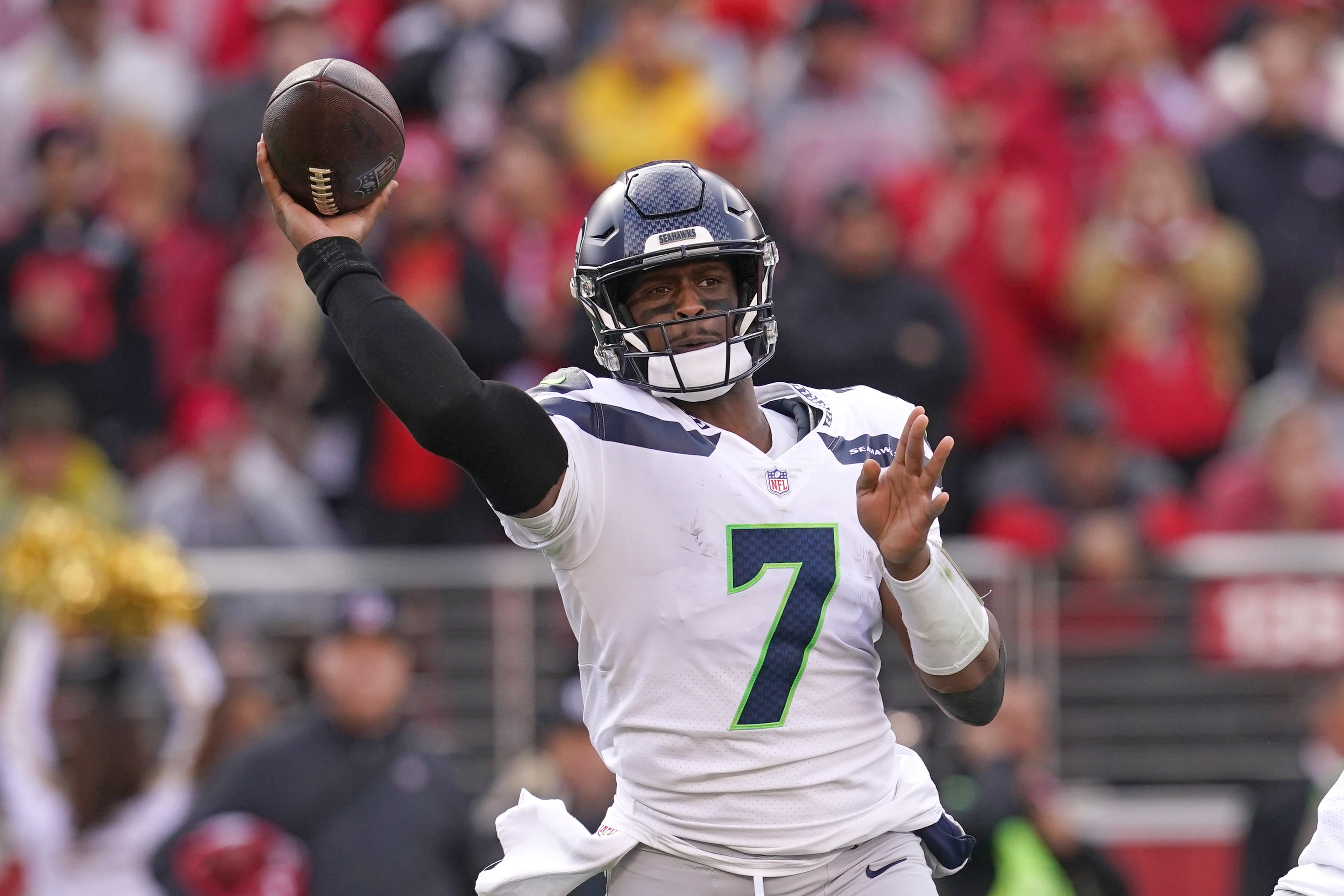 Jan 14, 2023; Santa Clara, California, USA; Seattle Seahawks quarterback Geno Smith (7) makes a throw in the second quarter of a wild card game against the San Francisco 49ers at Levi's Stadium.