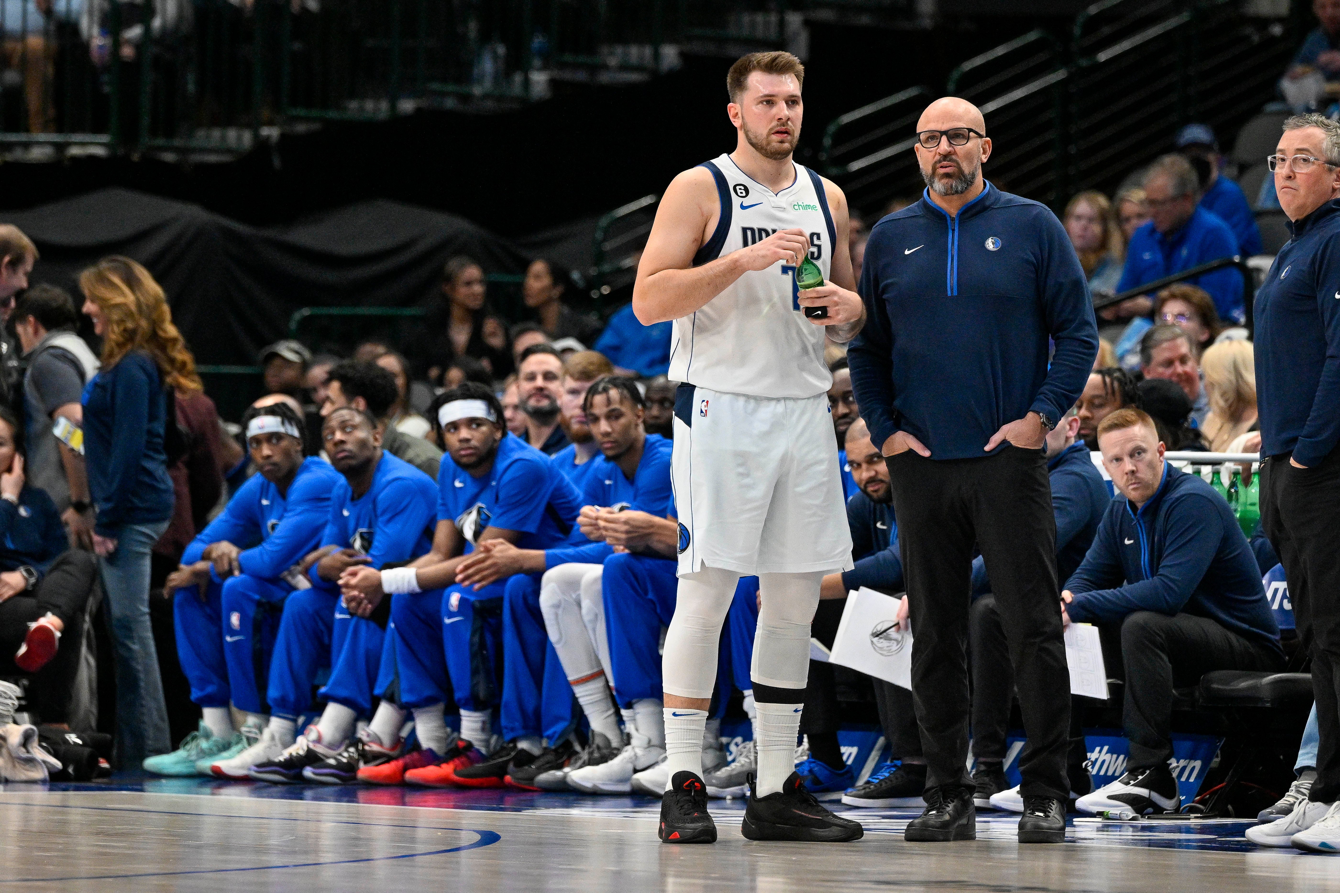 Jan 7, 2023; Dallas, Texas, USA; Dallas Mavericks guard Luka Doncic (77) talks with head coach Jason Kidd during the first quarter of the game against the New Orleans Pelicans at the American Airlines Center.