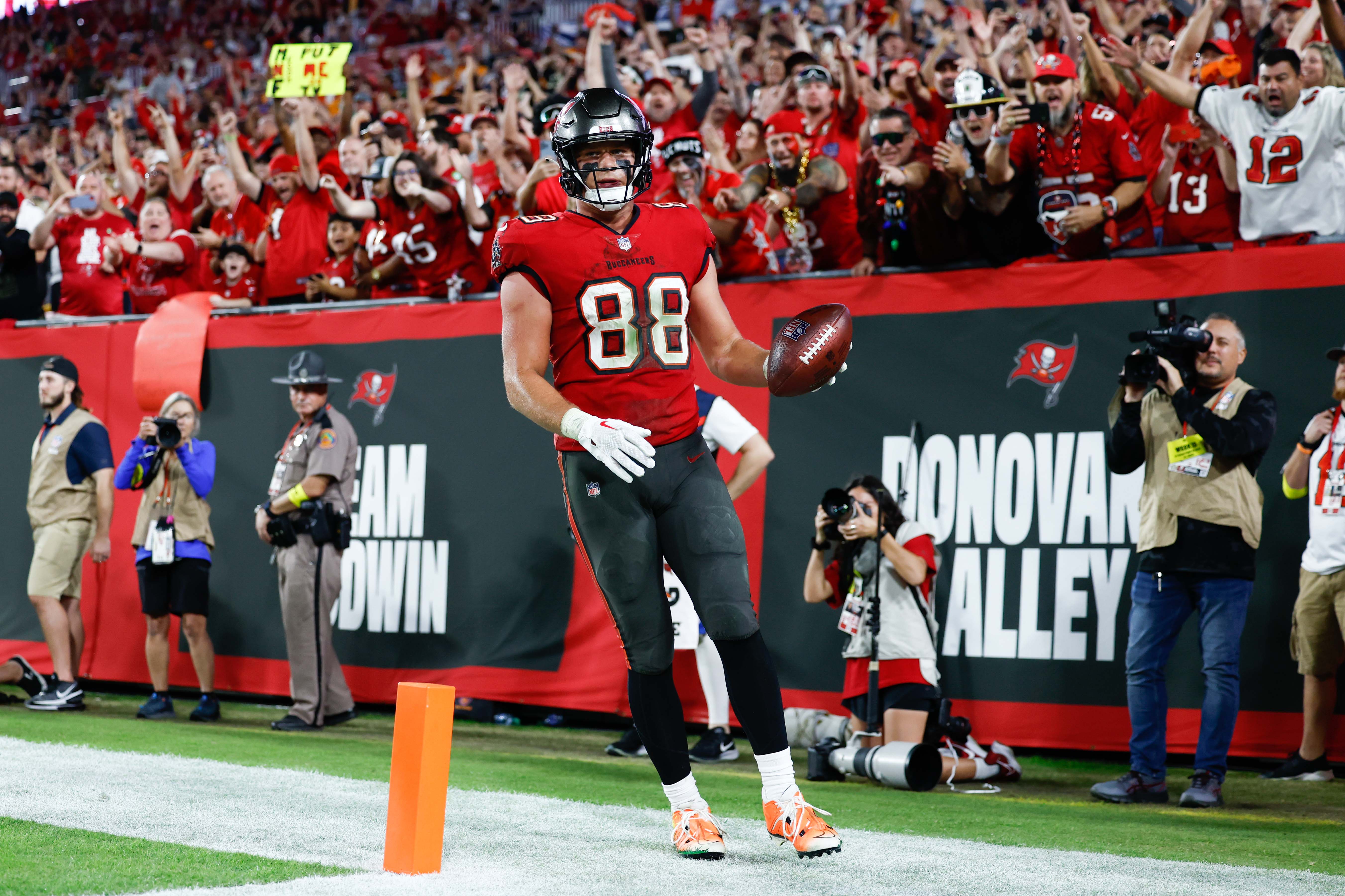 Dec 5, 2022; Tampa, Florida, USA; Tampa Bay Buccaneers tight end Cade Otton (88) reacts after scoring a touchdown against the New Orleans Saints during the fourth quarter at Raymond James Stadium. Mandatory Credit: Douglas DeFelice-USA TODAY Sports