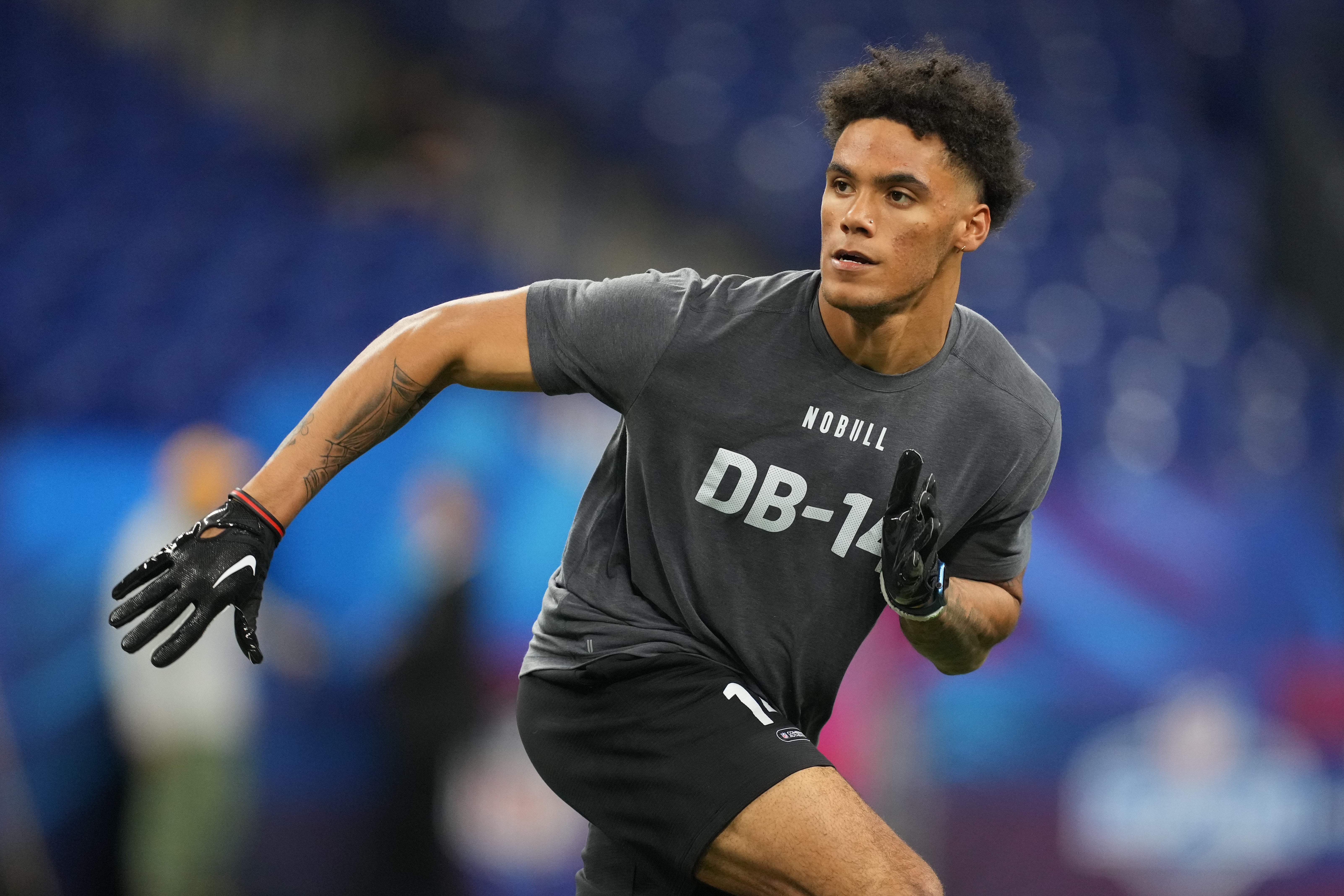 Mar 3, 2023; Indianapolis, IN, USA; Oregon defensive back Christian Gonzalez (DB14) participates in drills at Lucas Oil Stadium. Mandatory Credit: Kirby Lee-USA TODAY Sports