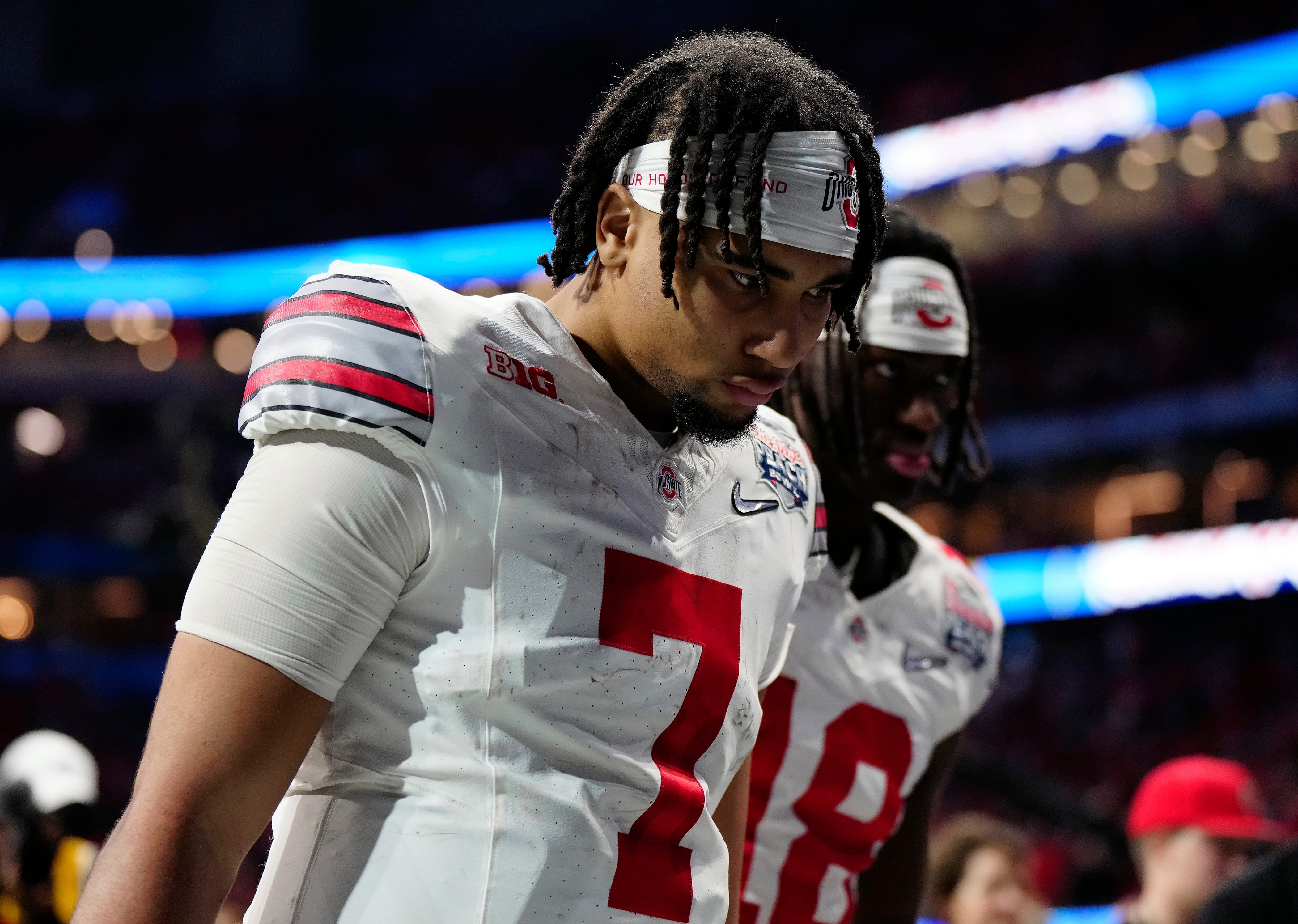 Ohio State quarterback C.J. Stroud (7) walks off the field after the Buckeyes lost to Georgia in the the Peach Bowl at Mercedes-Benz Stadium. Syndication The Columbus Dispatch