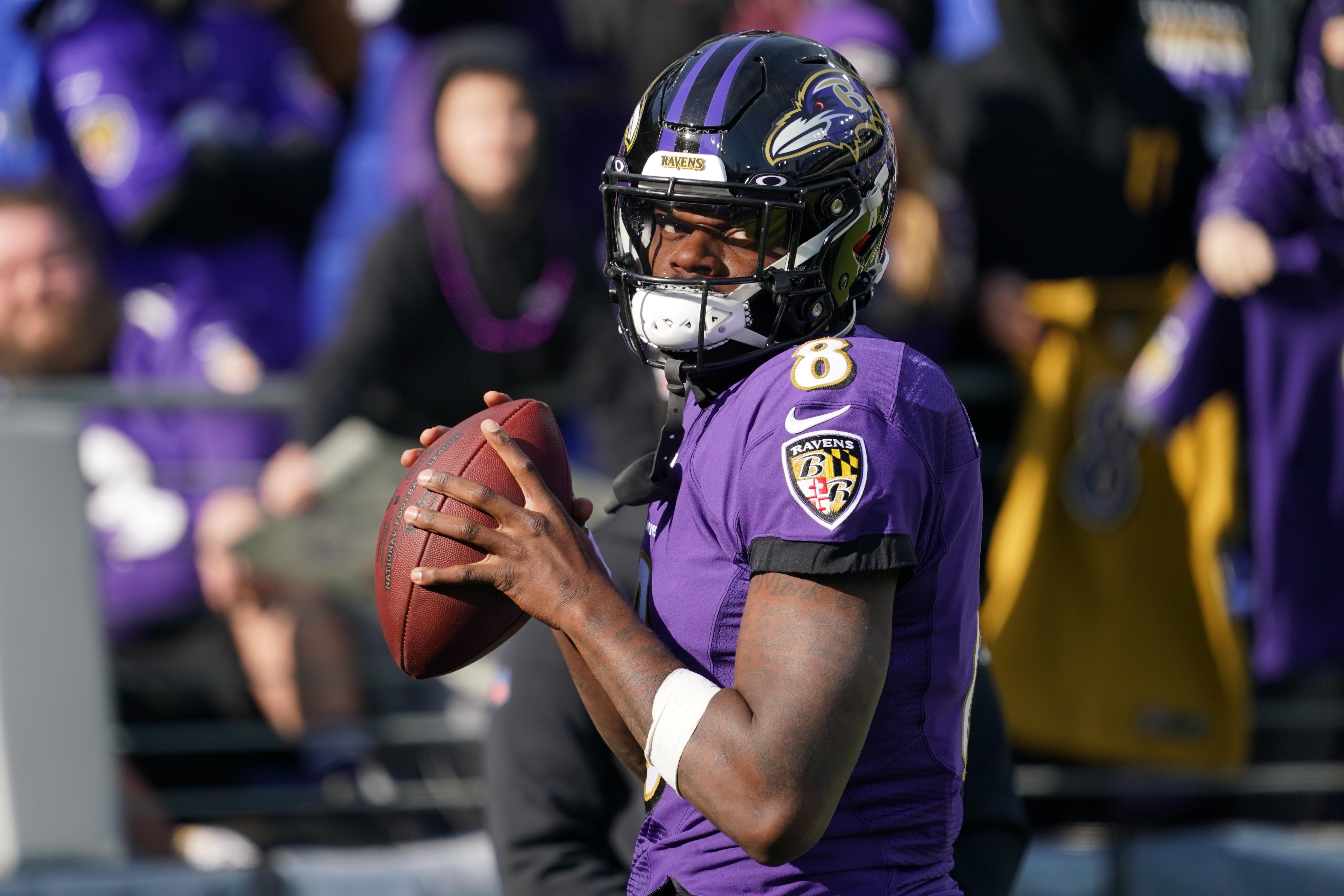Dec 4, 2022; Baltimore, Maryland, USA; Baltimore Ravens quarterback Lamar Jackson (8) warms up prior to the game against the Denver Broncos at M&T Bank Stadium. Mandatory Credit: Mitch Stringer-USA TODAY Sports