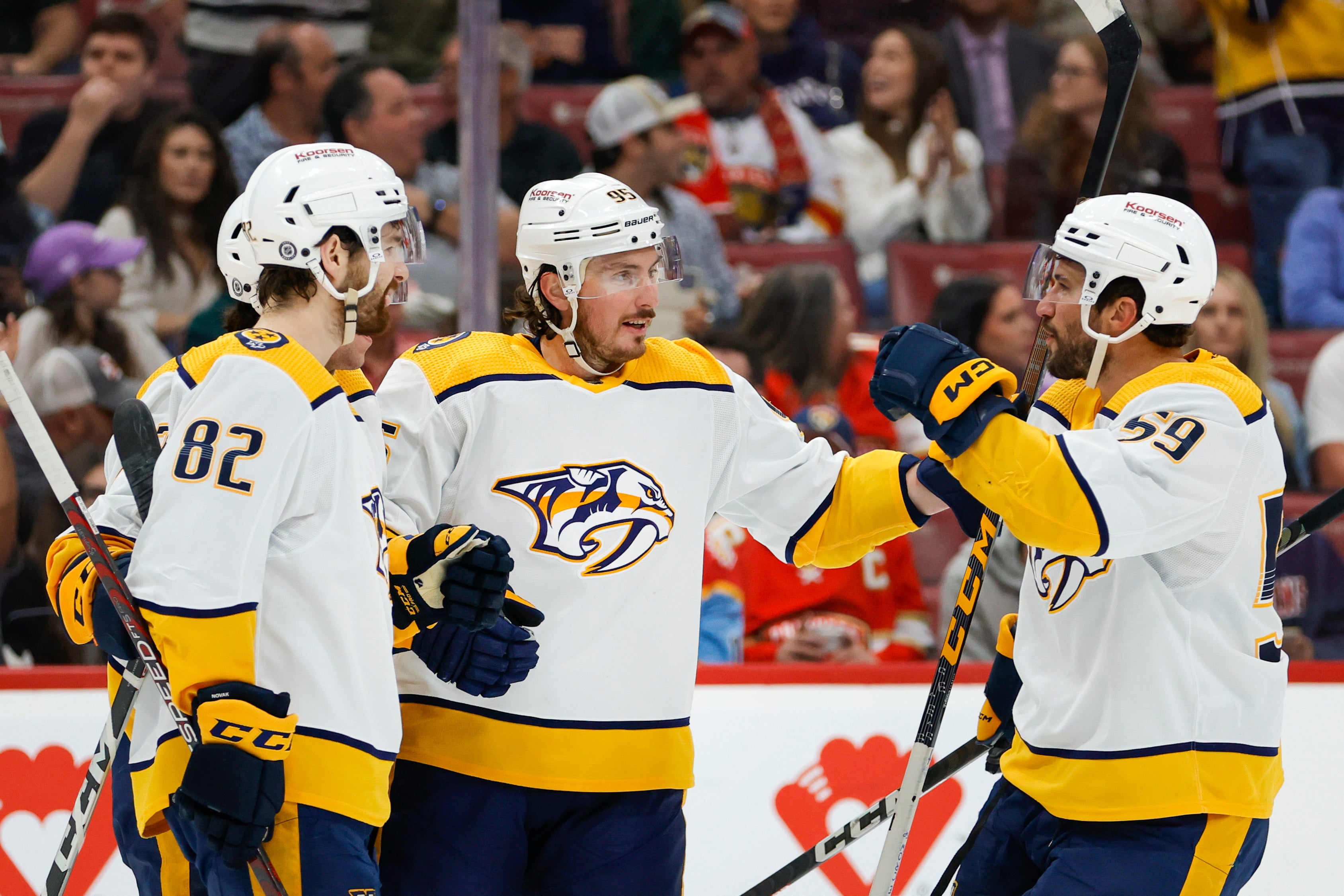 Nashville Predators Roman Josi, Matt Duchene, and Tommy Novak celebrate after a sick goal, probably by Duchene.