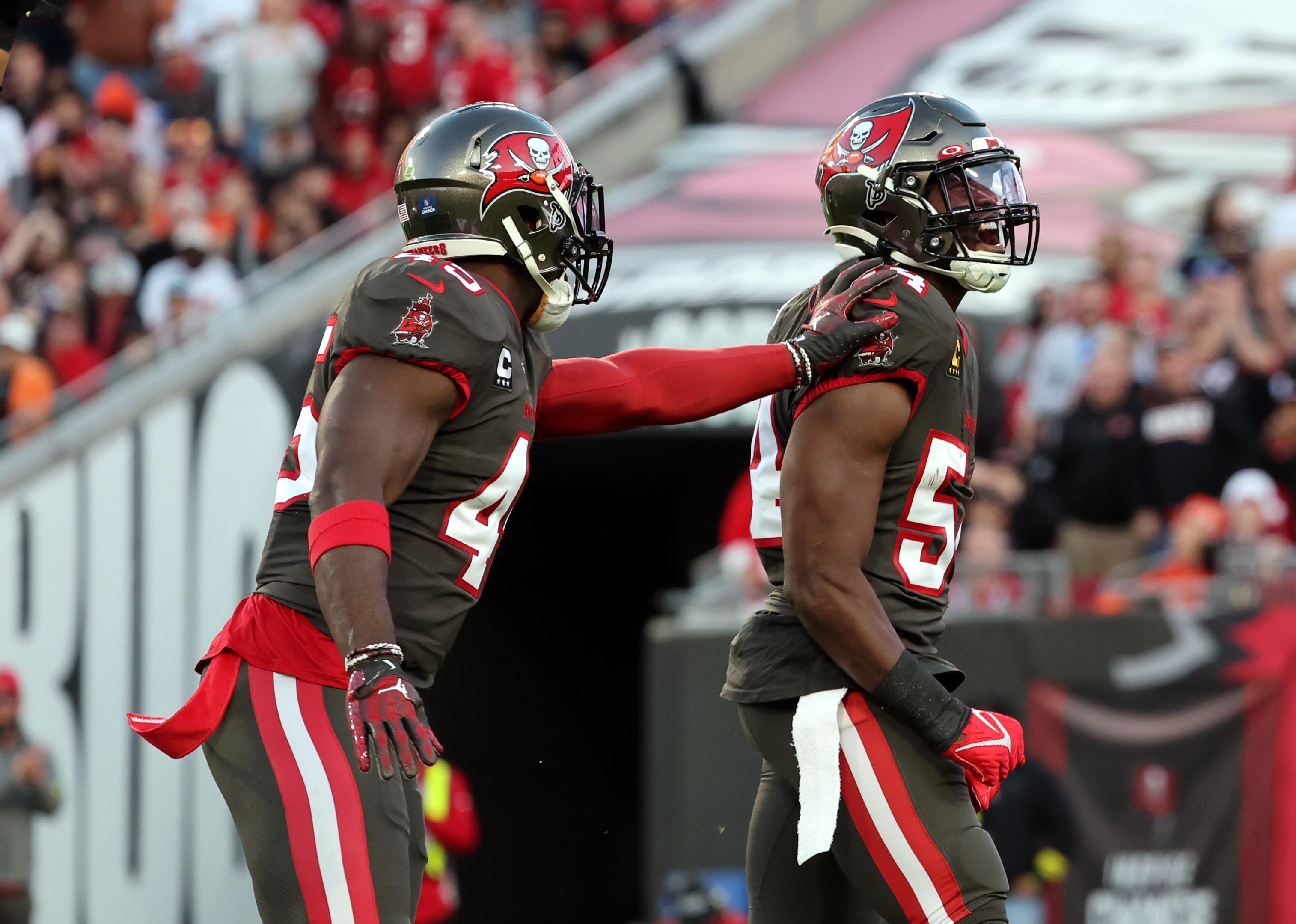 Dec 18, 2022; Tampa, Florida, USA; Tampa Bay Buccaneers linebacker Lavonte David (54) celebrates after he sacked Cincinnati Bengals quarterback Joe Burrow (9) (not pictured) during the second quarter at Raymond James Stadium. Mandatory Credit: Kim Klement-USA TODAY Sports