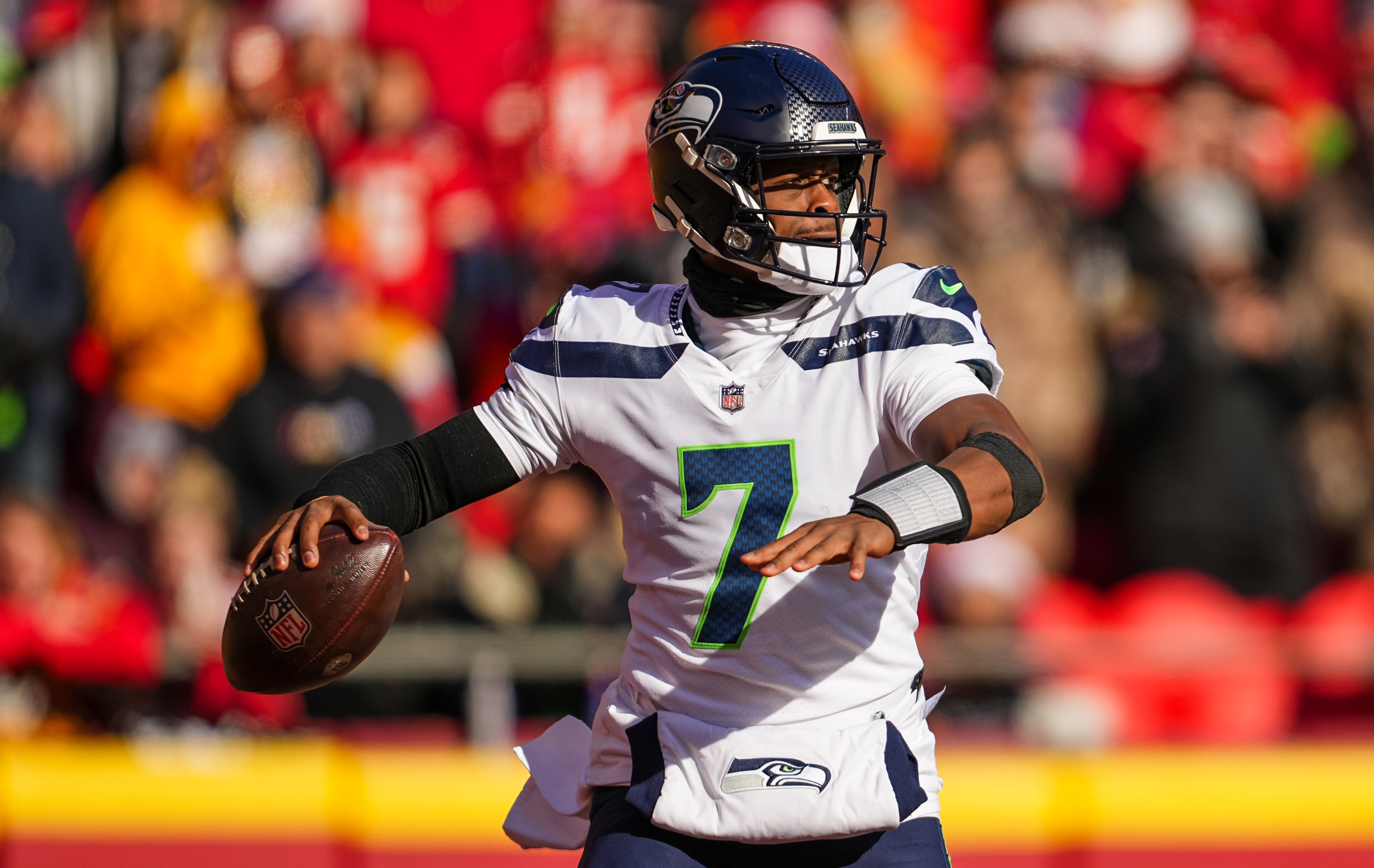 Dec 24, 2022; Kansas City, Missouri, USA; Seattle Seahawks quarterback Geno Smith (7) throws a pass during the first half against the Kansas City Chiefs at GEHA Field at Arrowhead Stadium.