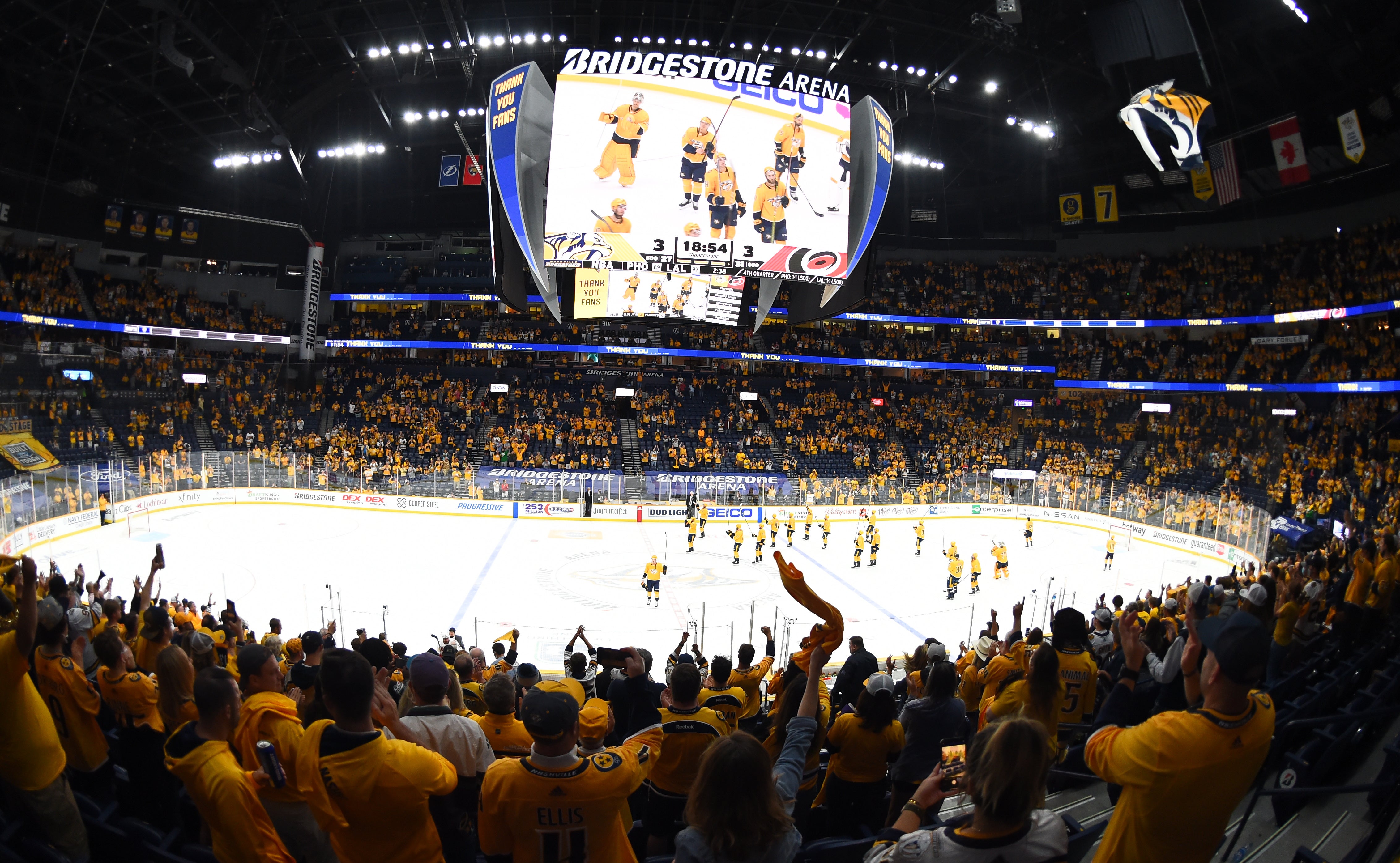 Predators fans cheer on the team