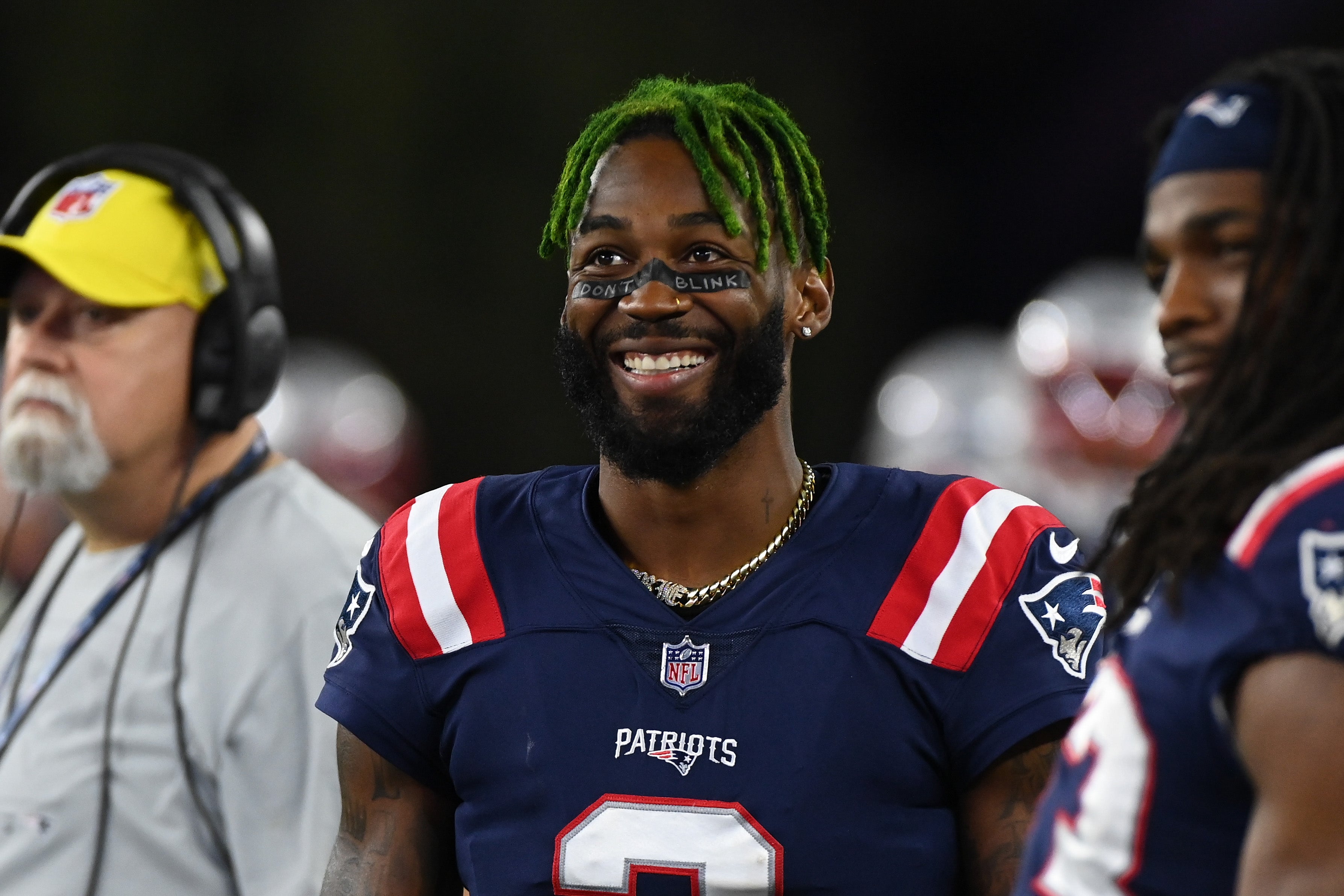 Aug 19, 2022; Foxborough, Massachusetts, USA; New England Patriots cornerback Jalen Mills (2) on the sideline during the second half of a preseason game against the Carolina Panthers at Gillette Stadium