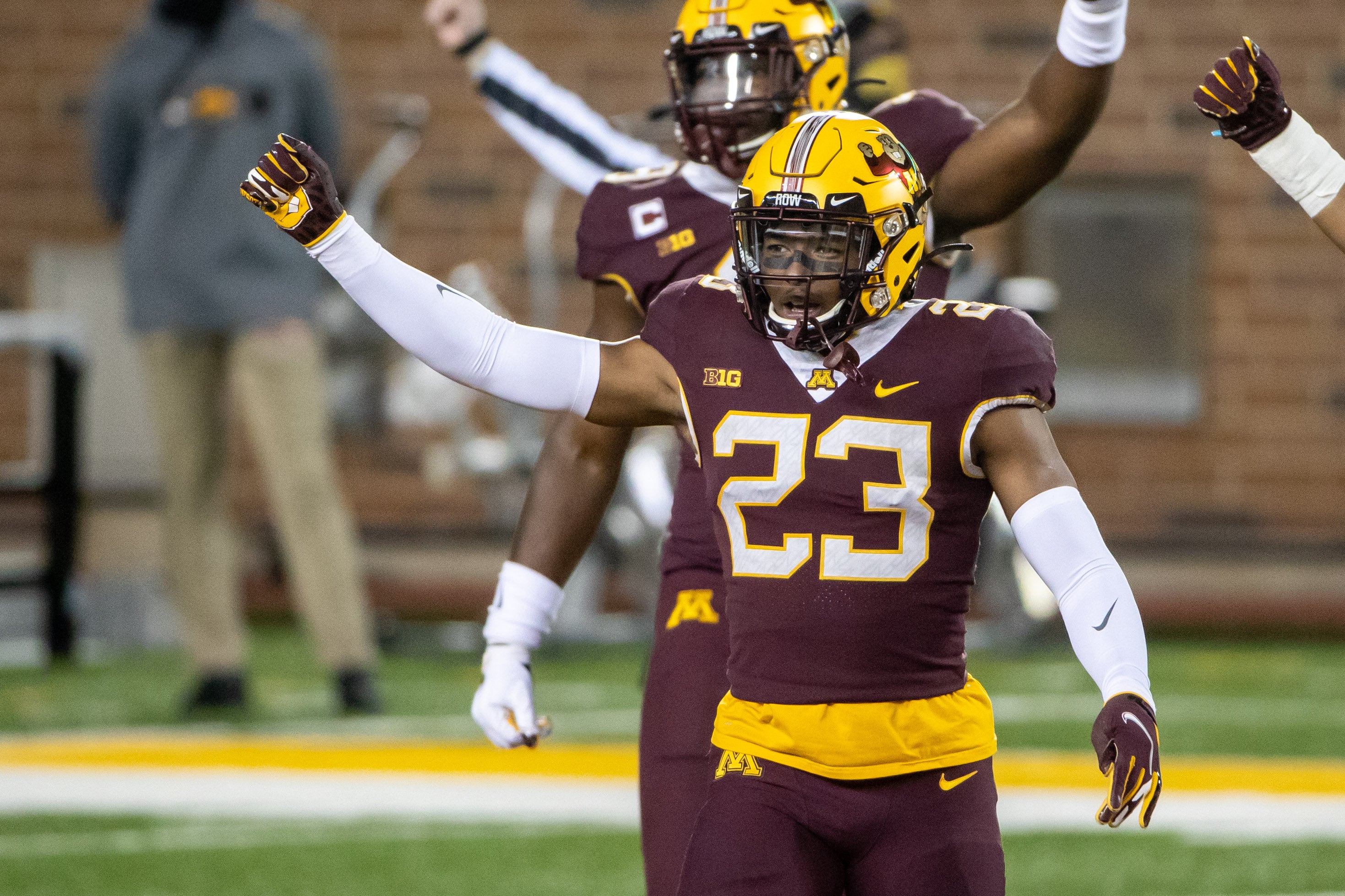 Nov 13, 2020; Minneapolis, Minnesota, USA; Minnesota Golden Gophers defensive back Jordan Howden (23) holds up his fist after making a tackle to force a fourth down in the first quarter against the Iowa Hawkeyes at TCF Bank Stadium.
