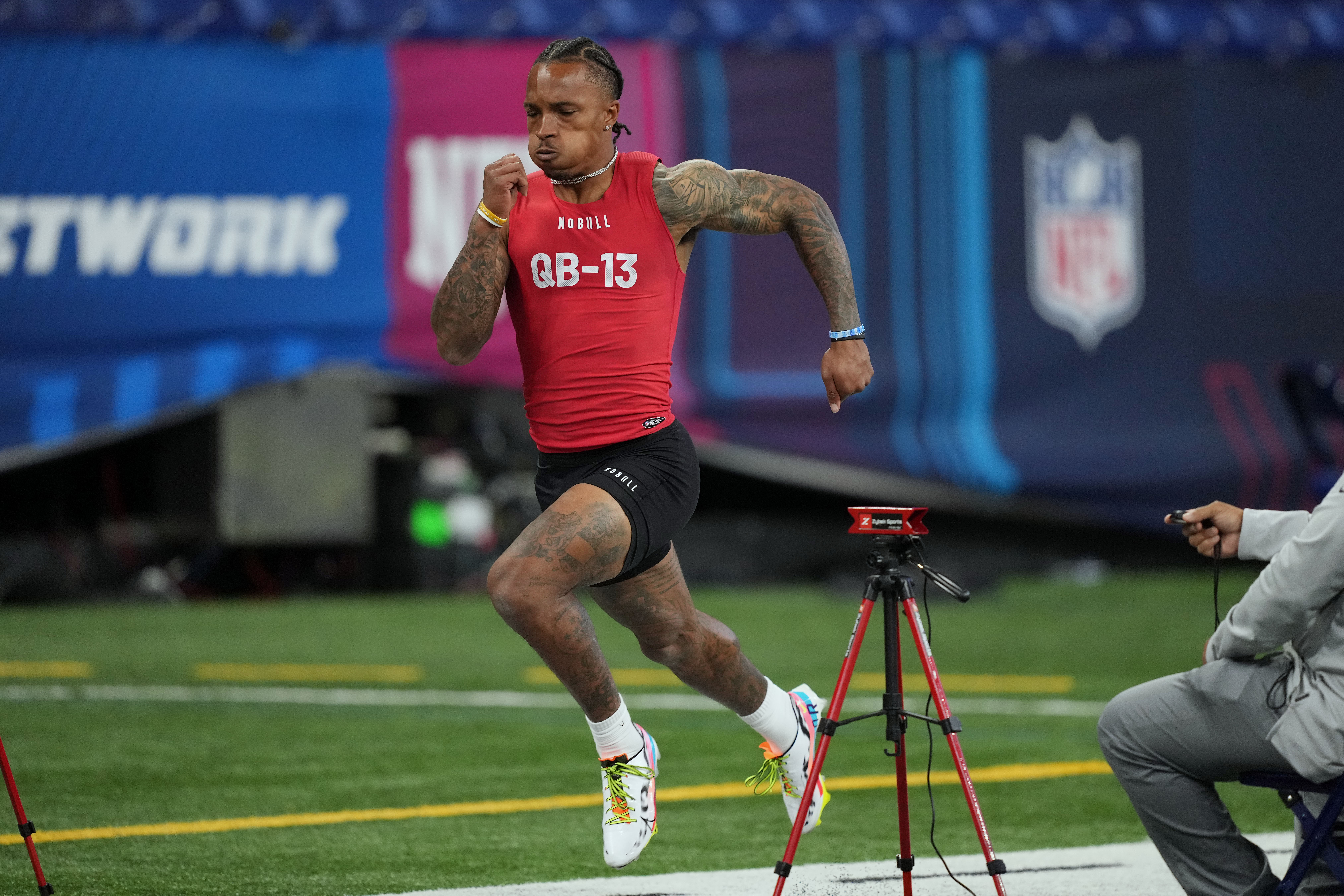 Mar 4, 2023; Indianapolis, IN, USA; UCLA quarterback Dorian Thompson Robinson (QB13) participates in the 40-yard dash at Lucas Oil Stadium. Mandatory Credit: Kirby Lee-USA TODAY Sports