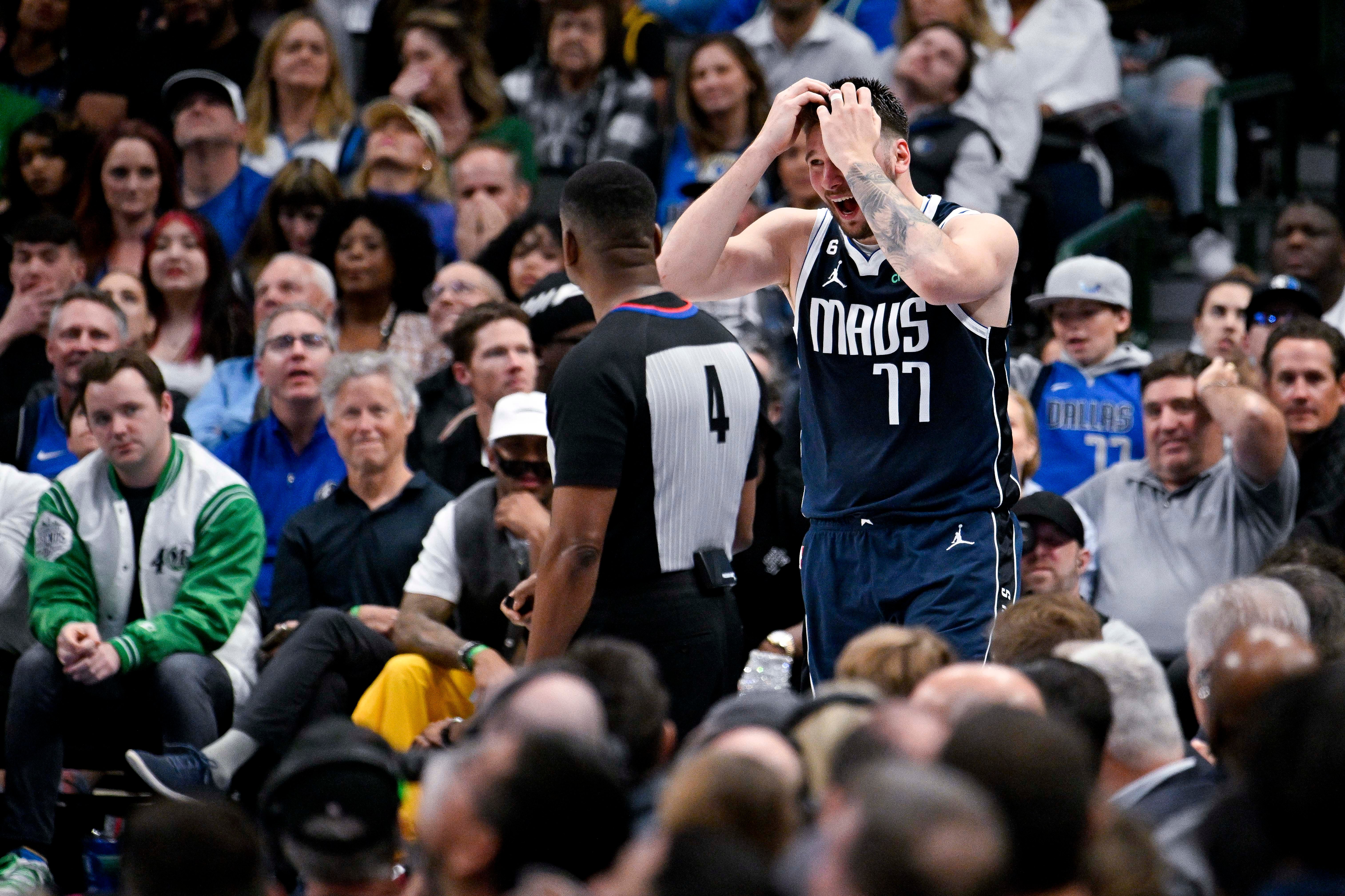 Mar 22, 2023; Dallas, Texas, USA; Dallas Mavericks guard Luka Doncic (77) reacts to a foul call during the second half against the Golden State Warriors at the American Airlines Center.