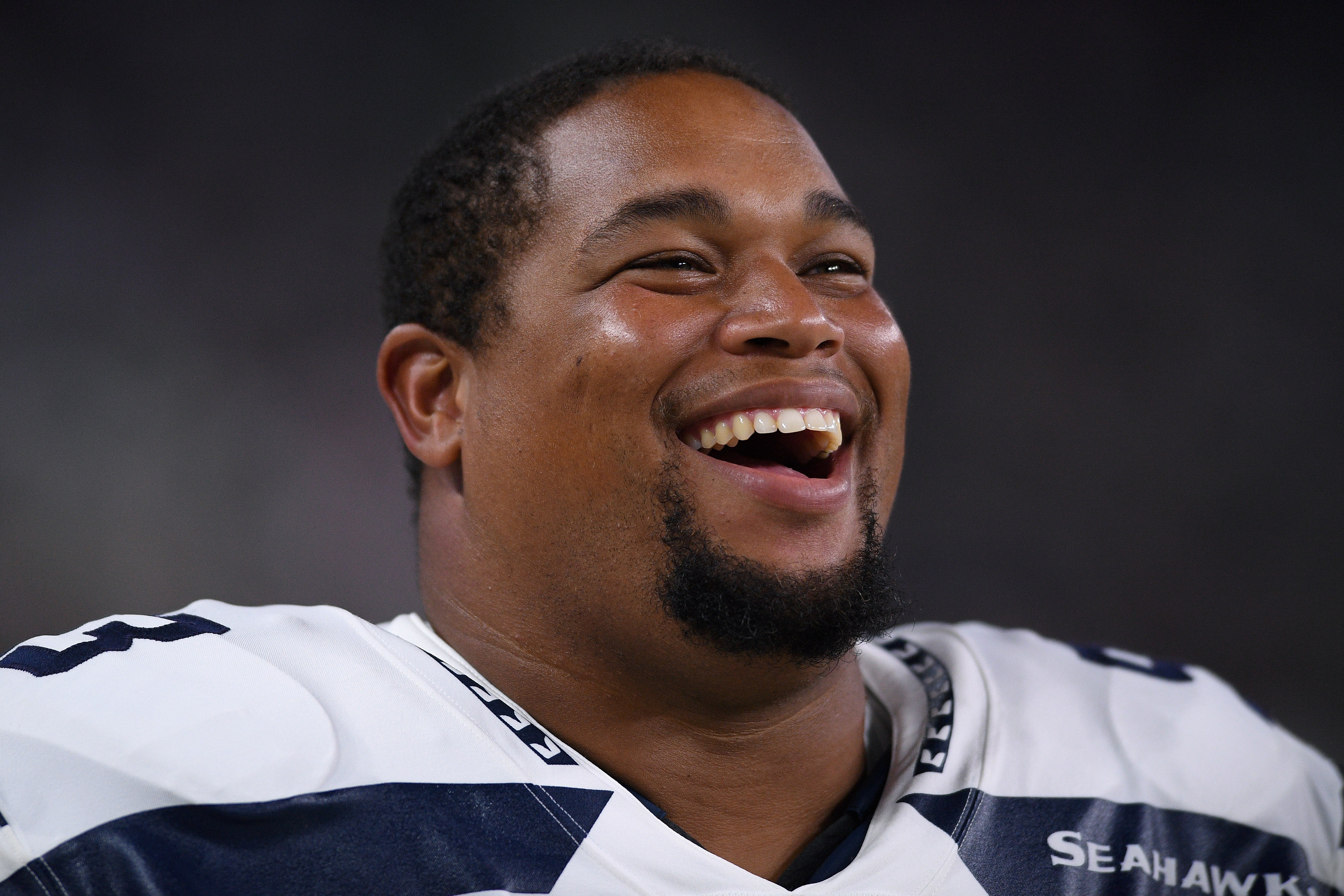 ug 14, 2021; Paradise, Nevada, USA; Seattle Seahawks defensive tackle Al Woods (93) smiles during the second half against the Las Vegas Raiders at Allegiant Stadium.