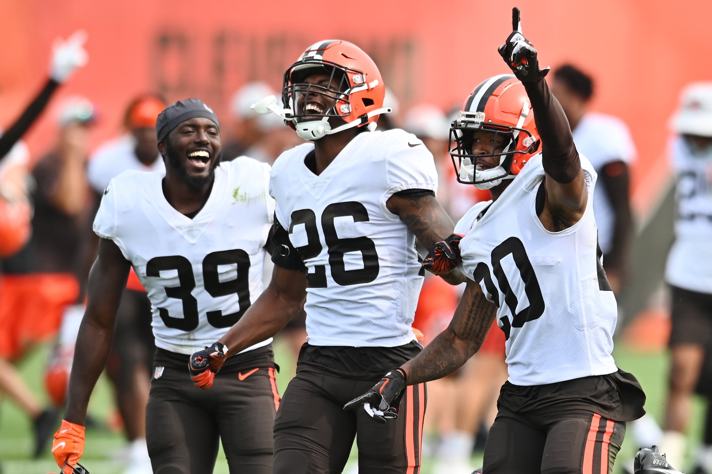 Aug 19, 2021; Berea, OH, USA; Cleveland Browns cornerback Greg Newsome II (20) celebrates with safety Richard LeCounte III (39) and cornerback Greedy Williams (26) after intercepting a pass during a joint practice with the New York Giants at CrossCountry Mortgage Campus.