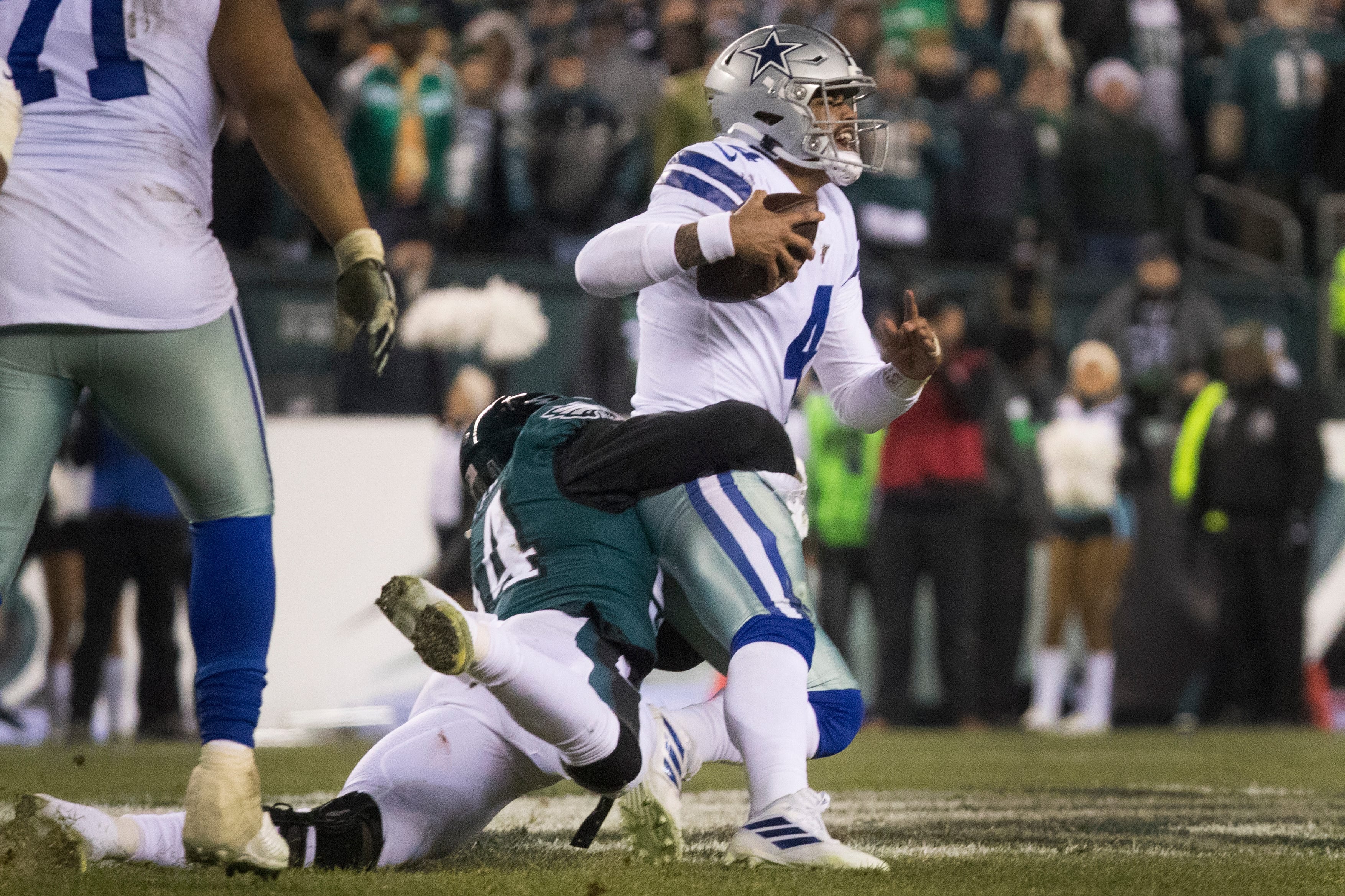 Eagles' Josh Sweat (94) sacks Dallas quarterback Dak Prescott (4) Sunday night at Lincoln Financial Field. The Eagles defeated the Cowboys 17-9. Sports Eagles Cowboys