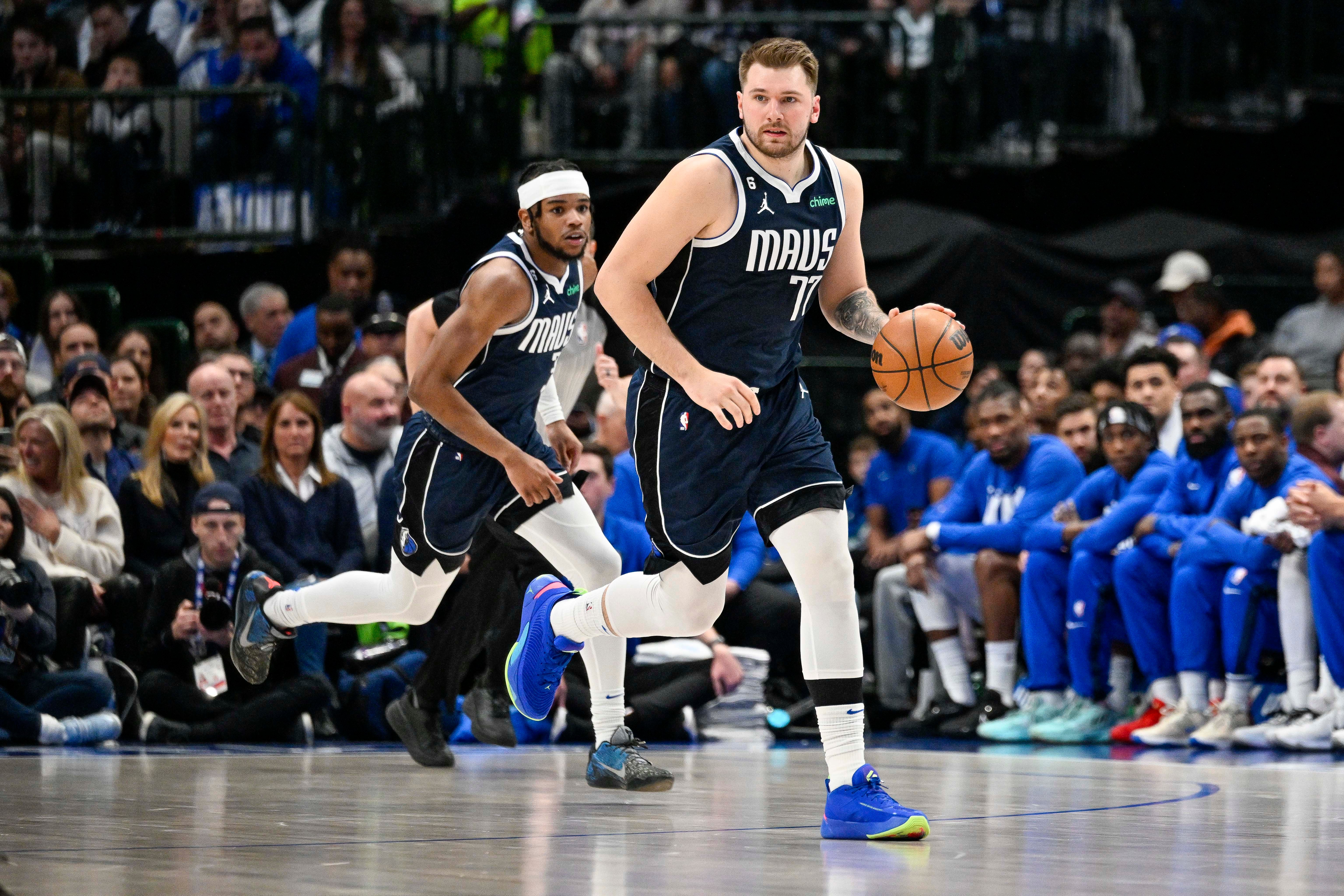 Feb 2, 2023; Dallas, Texas, USA; Dallas Mavericks guard Jaden Hardy (3) and guard Luka Doncic (77) in action during the game between the Dallas Mavericks and the New Orleans Pelicans at American Airlines Center.