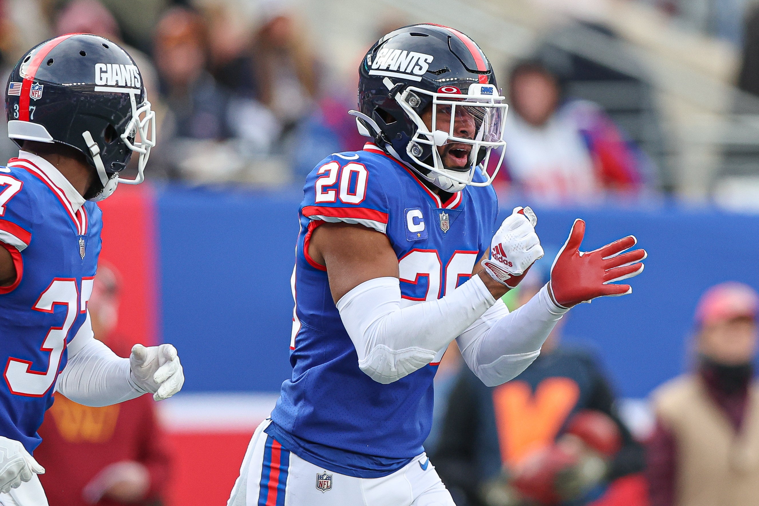 Dec 4, 2022; East Rutherford, New Jersey, USA; New York Giants safety Julian Love (20) celebrates a defensive stop during the first half against the Washington Commanders at MetLife Stadium.