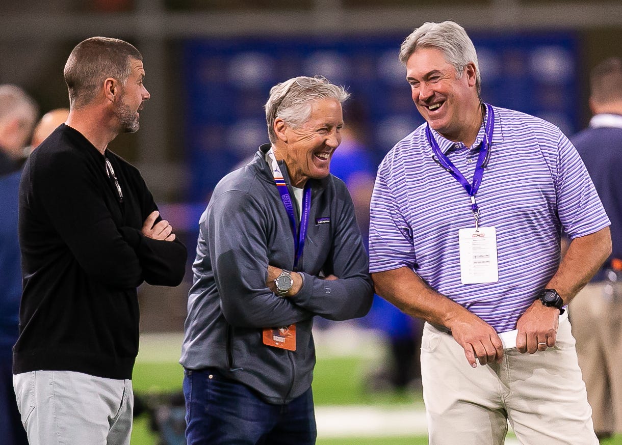 Florida Gators head coach Billy Napier, left, Seattle Seahawks Head Coach Pete Carroll, center and Jacksonville Jaguars Head Coach Doug Pederson have a laugh together during the 2023 NFL Pro Day held at Condron Family Indoor Practice Facility in Gainesville, FL on Thursday, March 30, 2023.