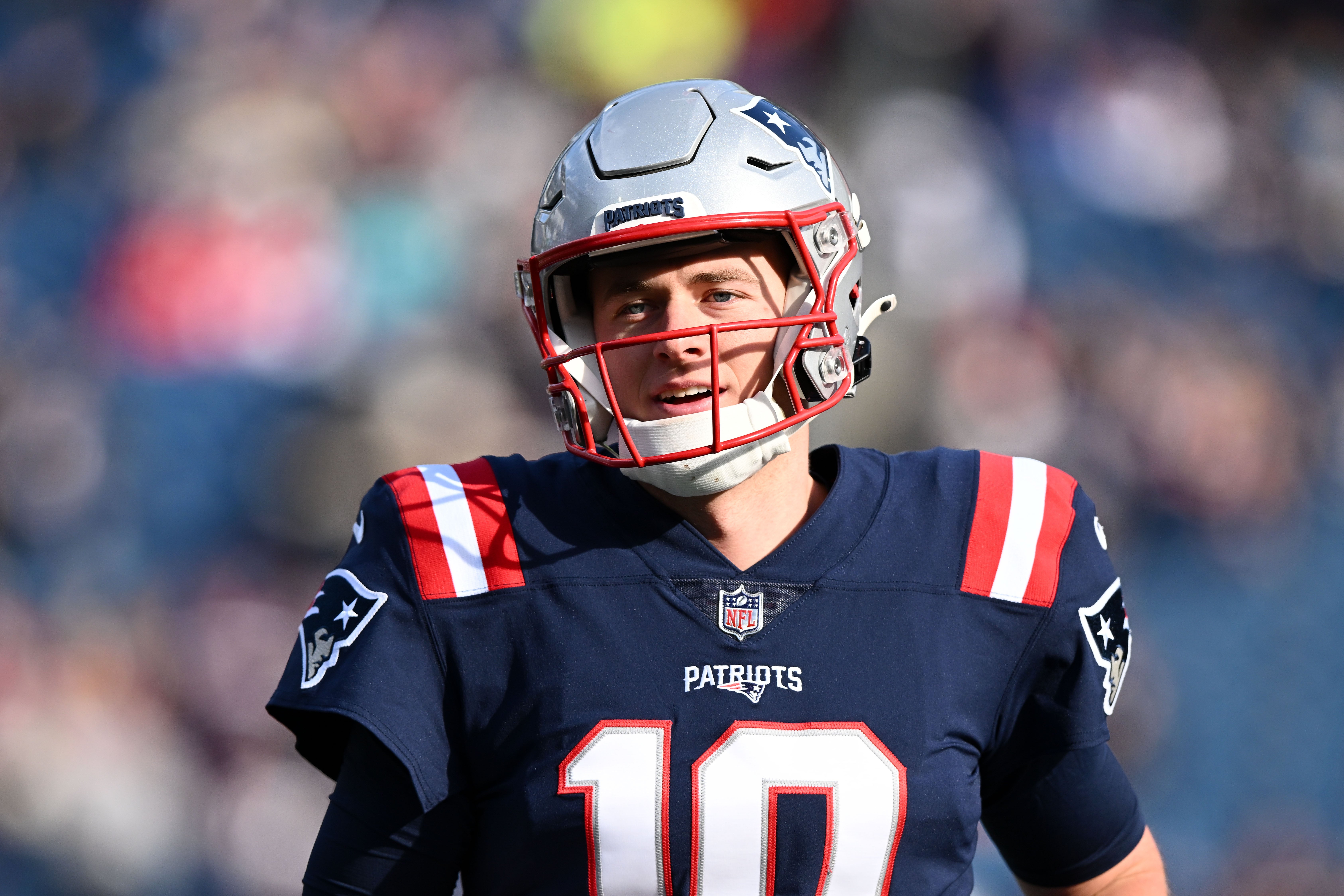 Jan 1, 2023; Foxborough, Massachusetts, USA; New England Patriots quarterback Mac Jones (10) sprints during warmups before a game against the Miami Dolphins at Gillette Stadium.