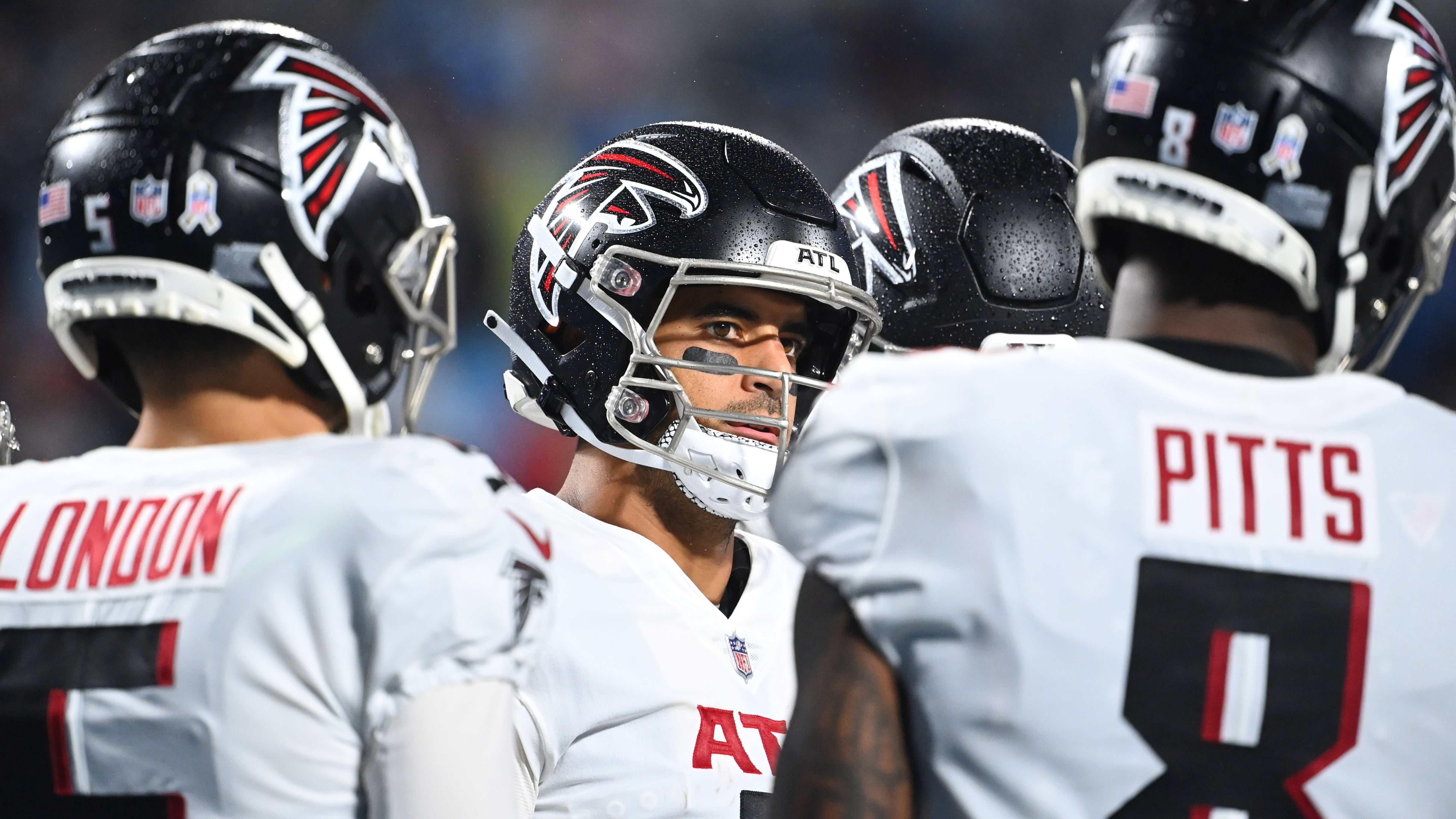Nov 10, 2022; Charlotte, North Carolina, USA; Atlanta Falcons quarterback Marcus Mariota (1) in the huddle in the fourth quarter at Bank of America Stadium.