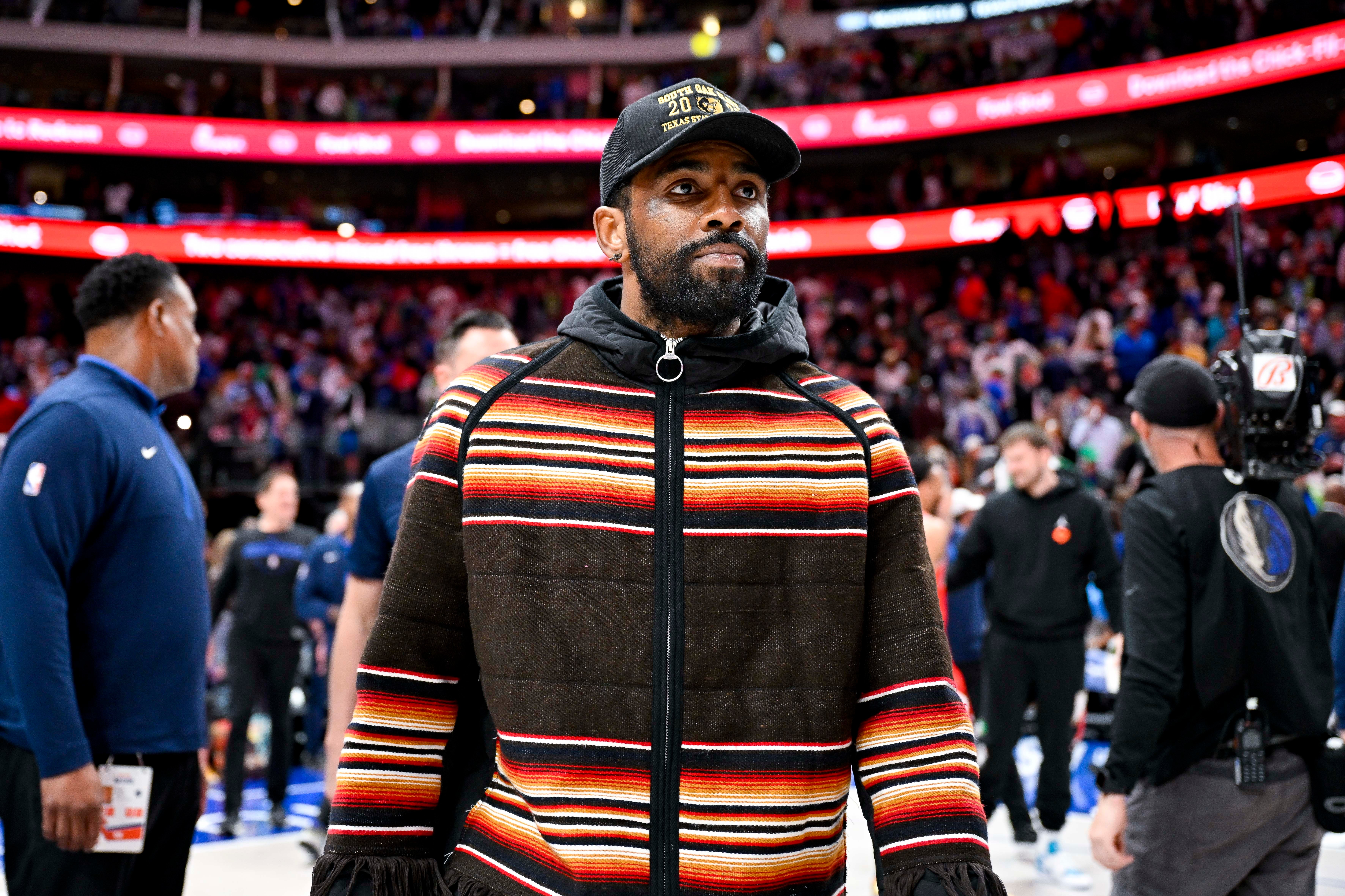 Apr 7, 2023; Dallas, Texas, USA; Dallas Mavericks guard Kyrie Irving (2) walks off the court after the Mavericks loss to the Chicago Bulls at the American Airlines Center.