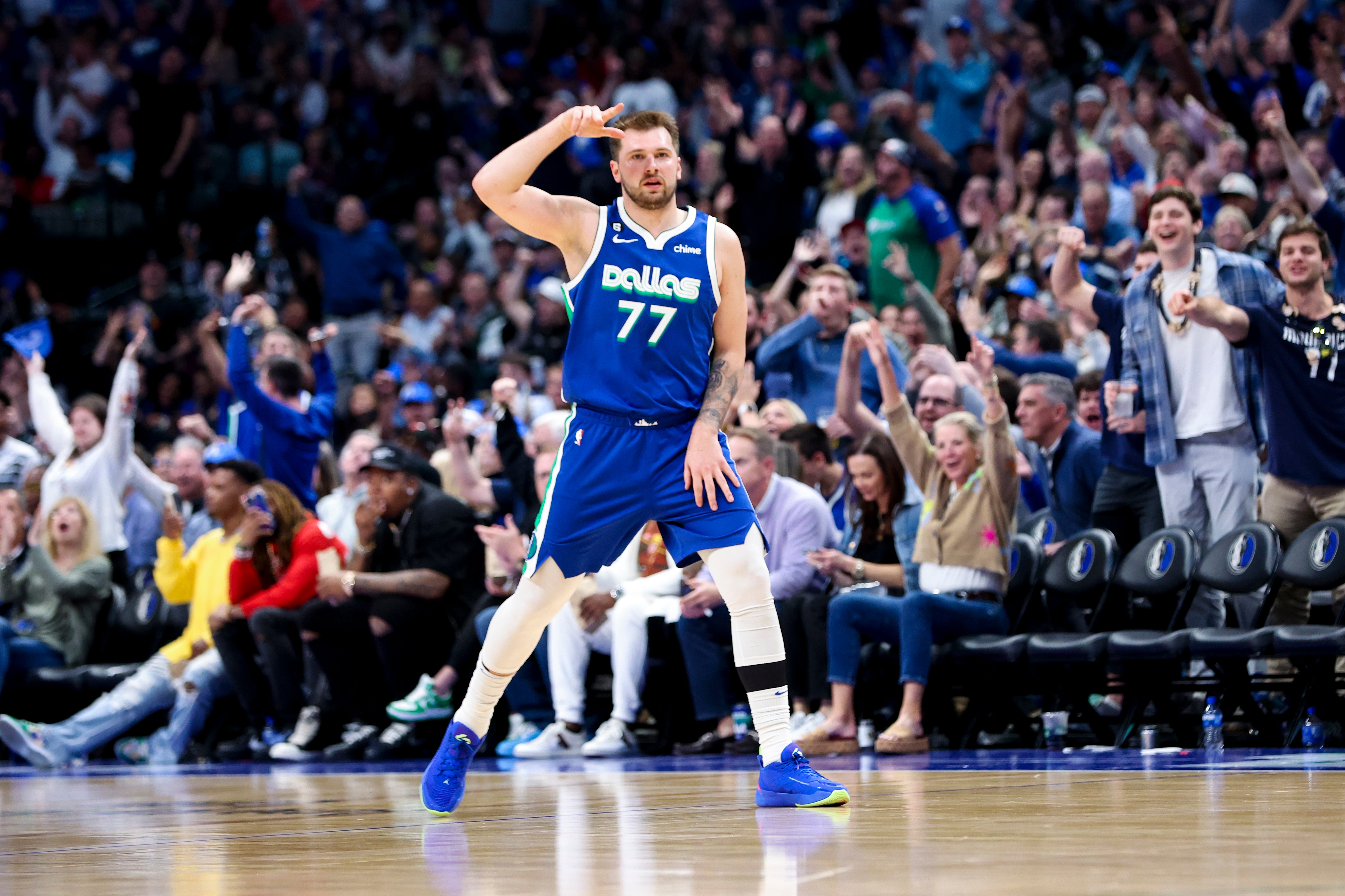 pr 5, 2023; Dallas, Texas, USA; Dallas Mavericks guard Luka Doncic (77) reacts after scoring during the third quarter against the Sacramento Kings at American Airlines Center.