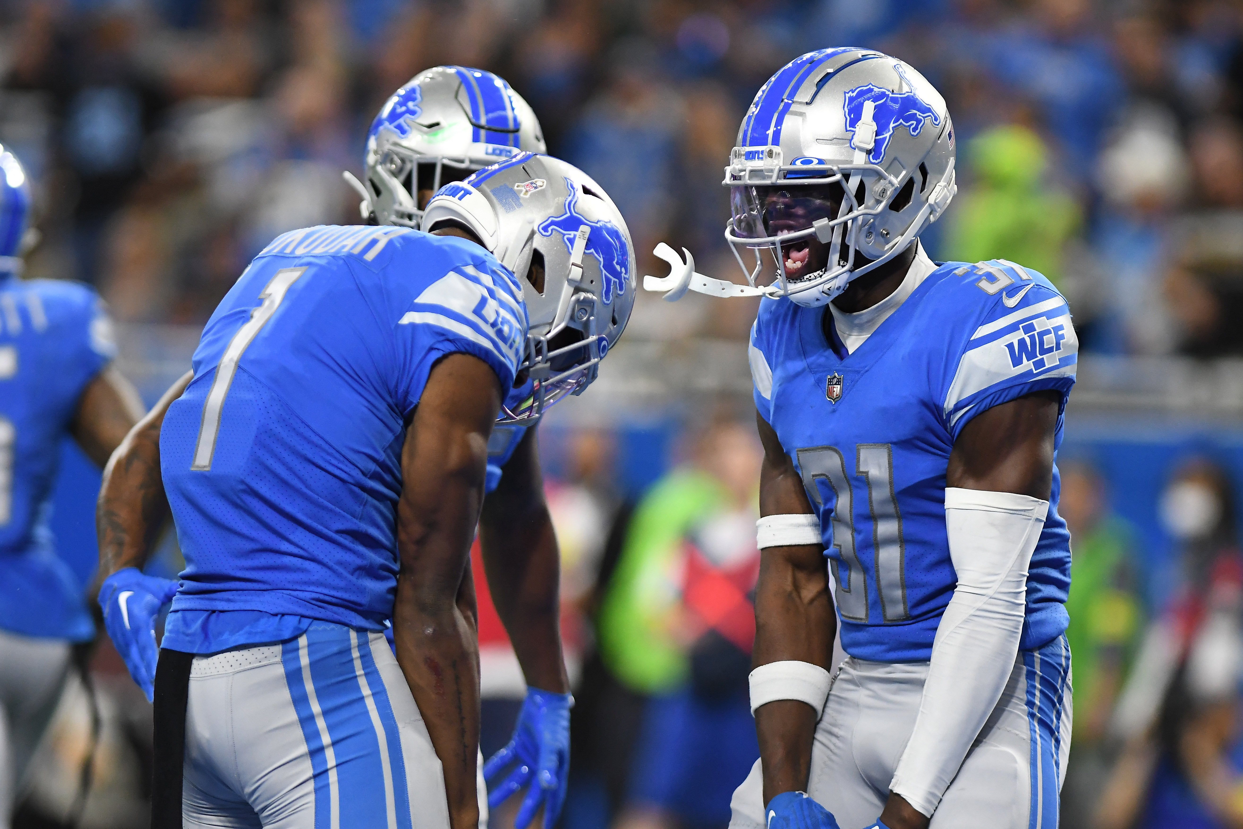 Nov 6, 2022; Detroit, Michigan, USA; Detroit Lions safety Kerby Joseph (31) celebrates with cornerback Jeff Okudah (1) (left) after breaking up a pass from Green Bay Packers quarterback Aaron Rodgers (12) in the third quarter at Ford Field. Mandatory Credit: Lon Horwedel-USA TODAY Sports