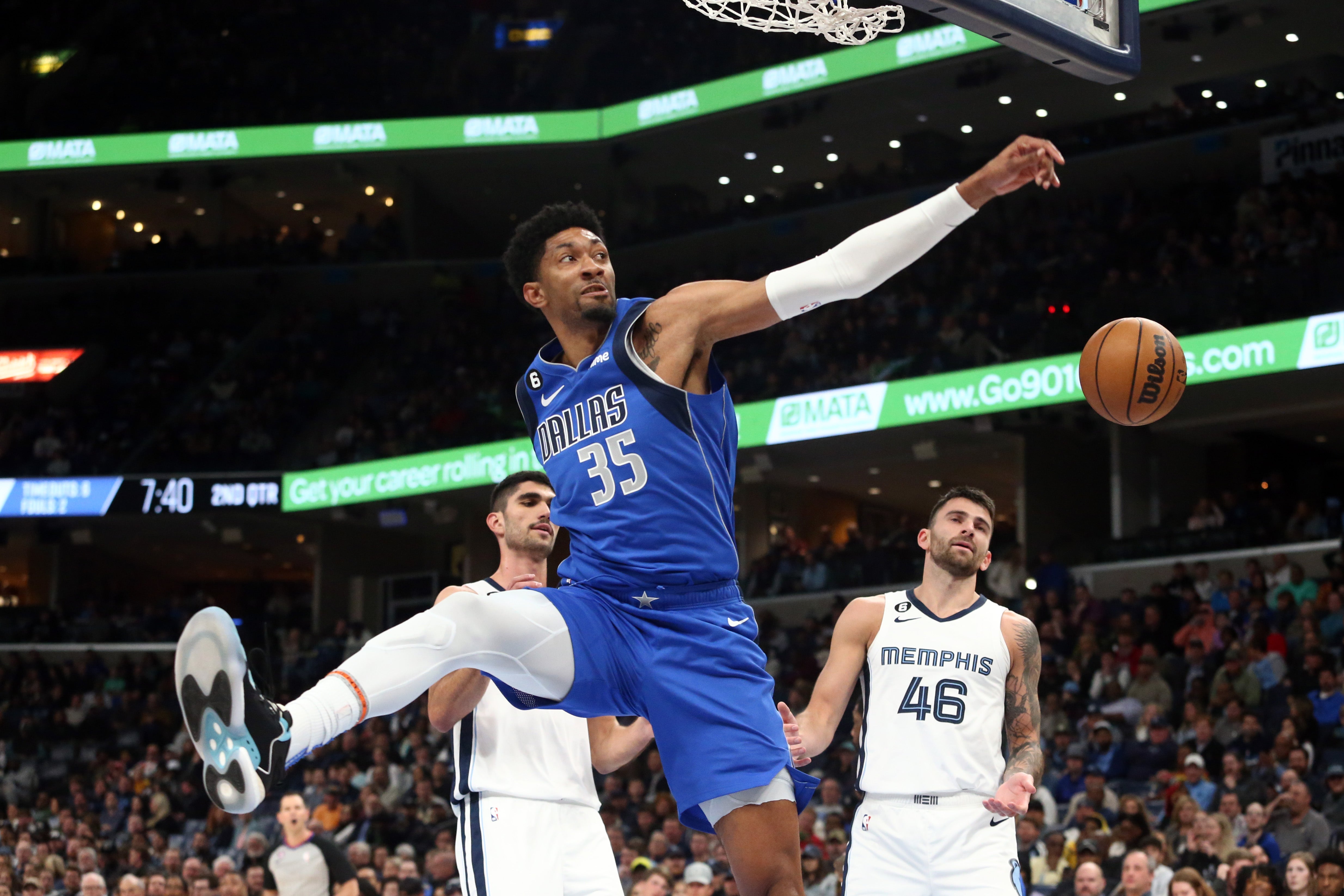 Mar 20, 2023; Memphis, Tennessee, USA; Dallas Mavericks forward Christian Wood (35) dunks during the first half against the Memphis Grizzlies at FedExForum.