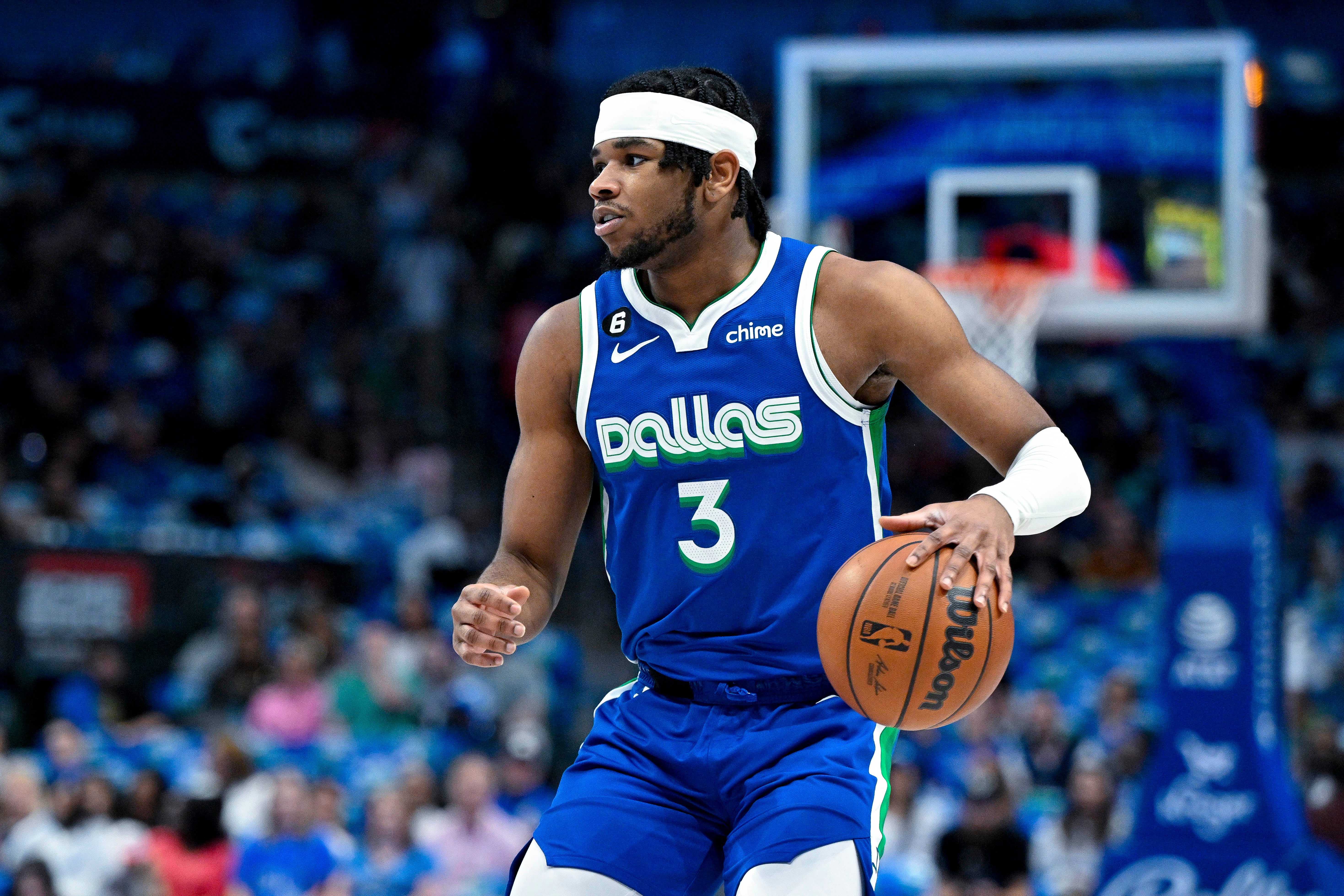 Apr 9, 2023; Dallas, Texas, USA; Dallas Mavericks guard Jaden Hardy (3) brings the ball up court against the San Antonio Spurs during the first quarter at the American Airlines Center.