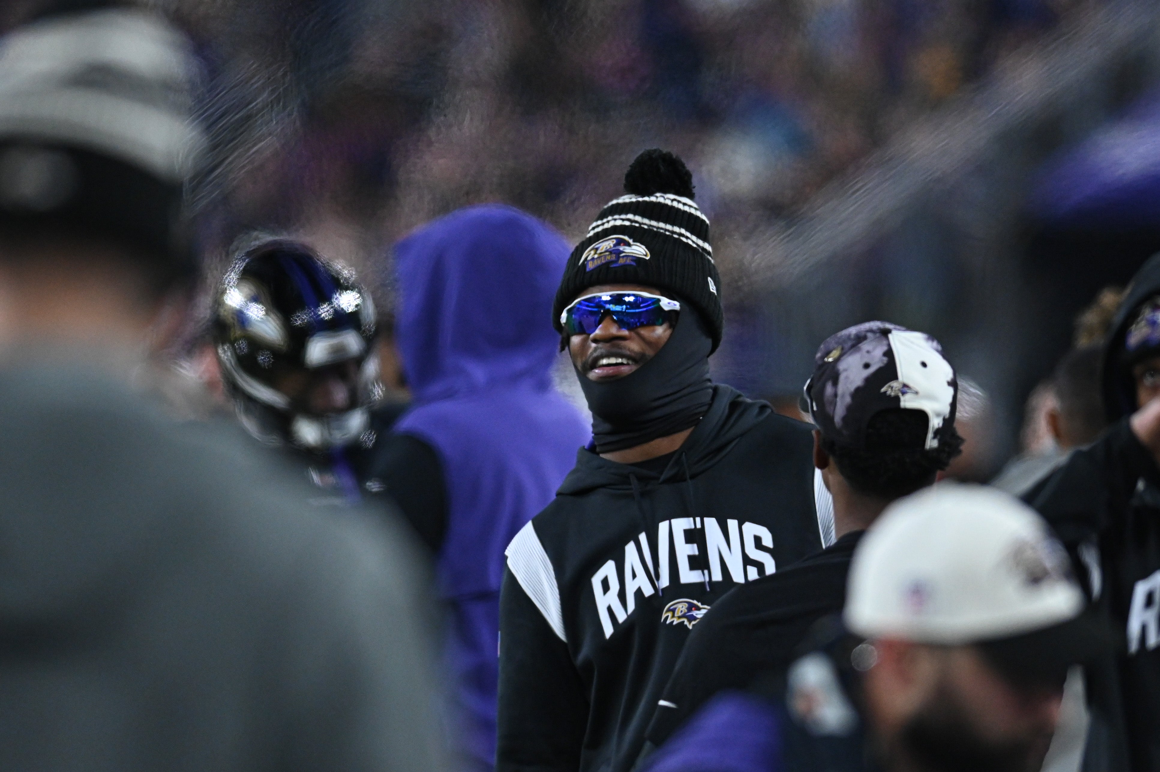 Caption:Jan 1, 2023; Baltimore, Maryland, USA; Baltimore Ravens quarterback Lamar Jackson (8) stands on the sidelines during the second half against the Pittsburgh Steelers at M&T Bank Stadium.