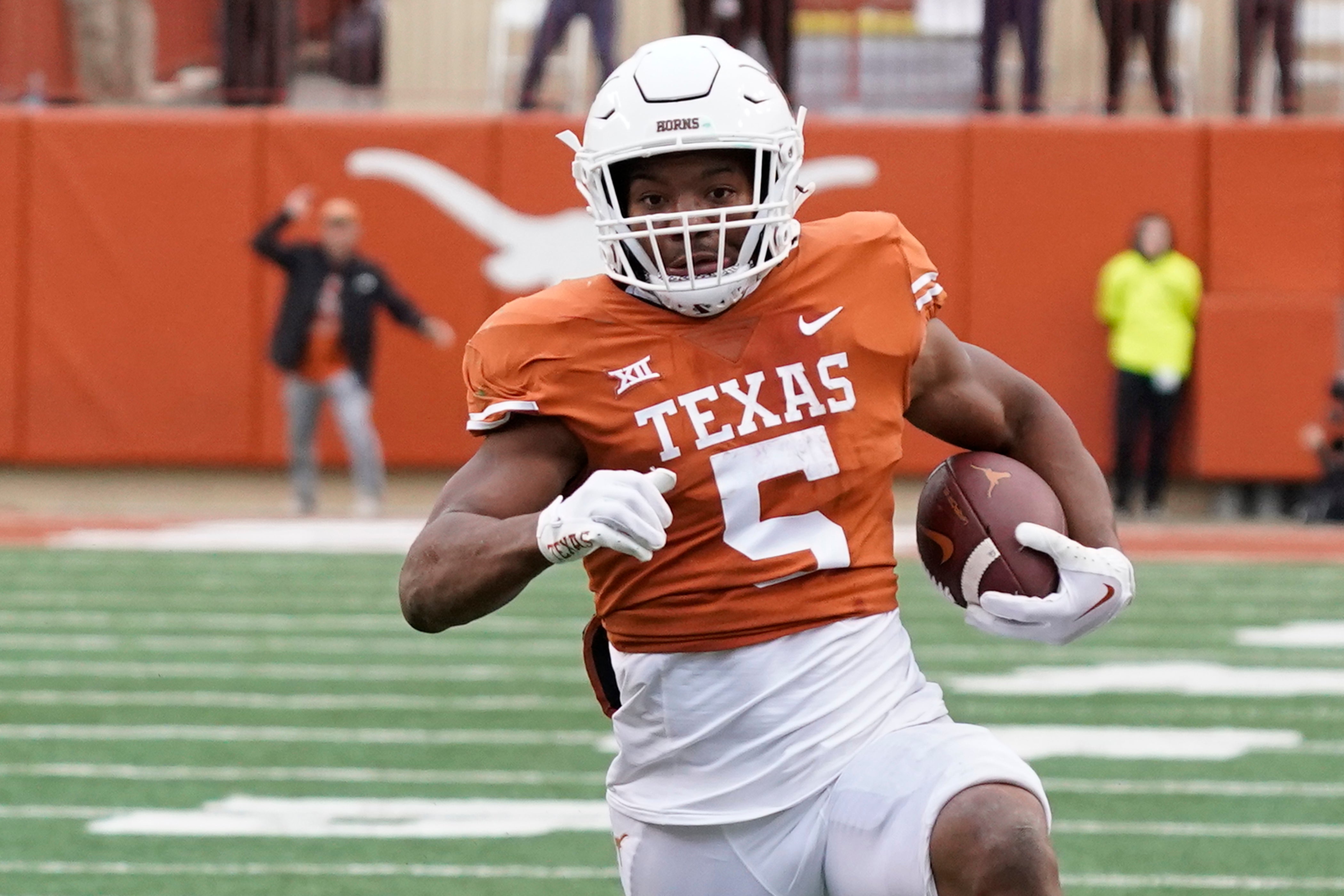 Nov 25, 2022; Austin, Texas, USA; Texas Longhorns running back Bijan Robinson (5) runs during the second half against the Baylor Bears at Darrell K Royal-Texas Memorial Stadium.