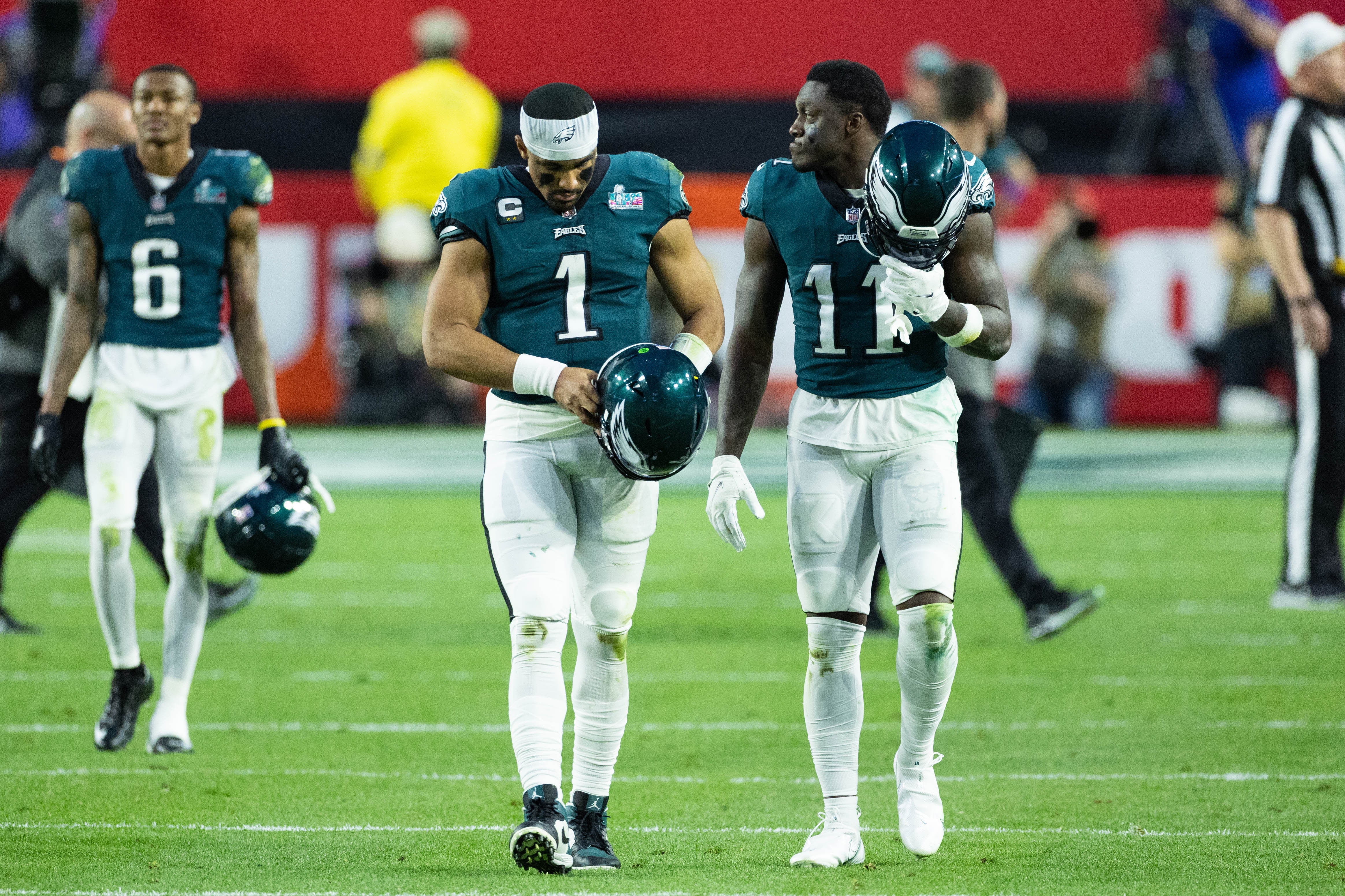 Feb 12, 2023; Glendale, Arizona, US; Philadelphia Eagles quarterback Jalen Hurts (1) and wide receiver A.J. Brown (11) walk to the locker room at halftime at Super Bowl LVII at State Farm Stadium. Mandatory Credit: Bill Streicher-USA TODAY Sports
