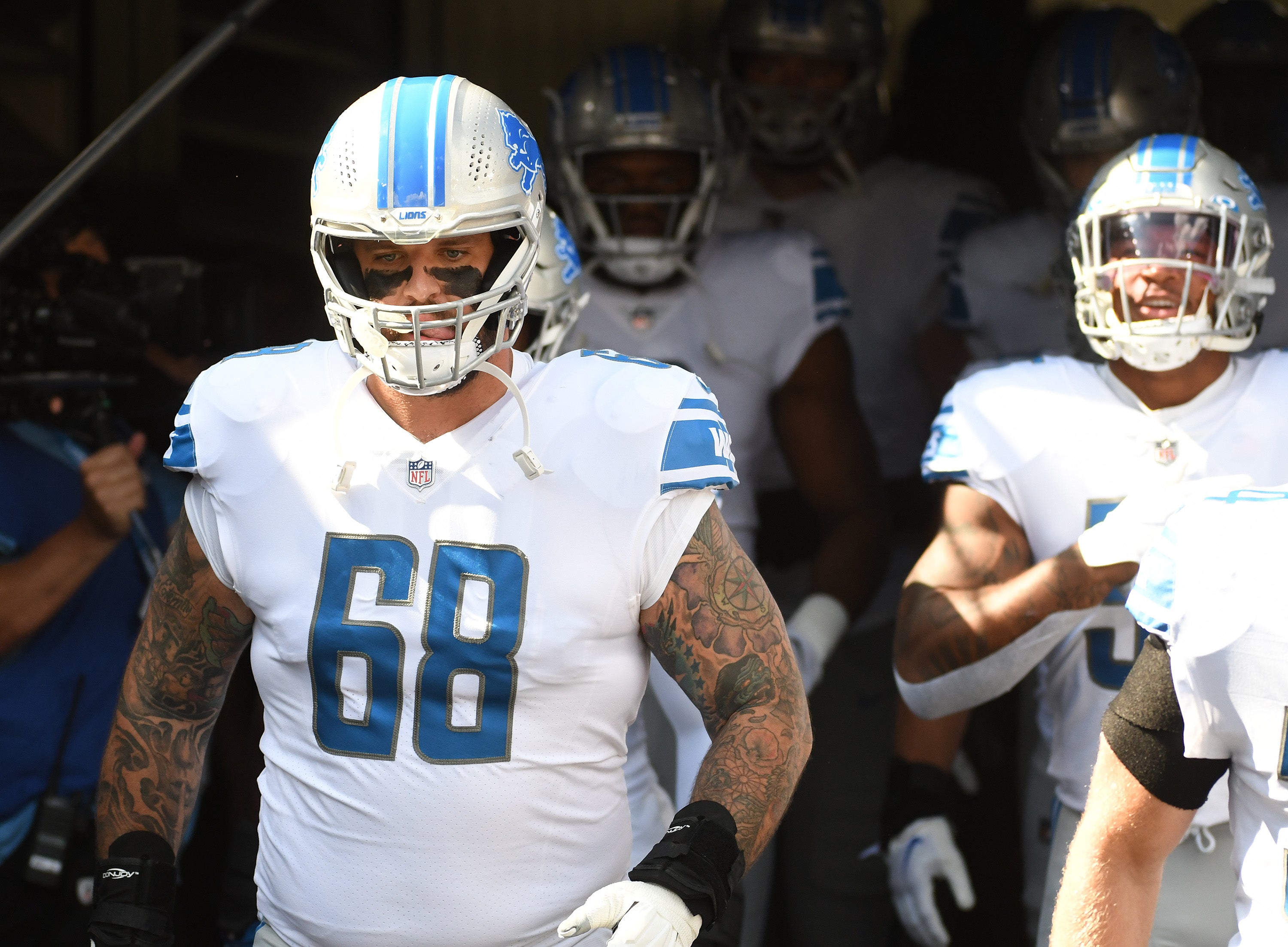 Aug 28, 2022; Pittsburgh, Pennsylvania, USA; Detroit Lions tackle Taylor Decker (68) leads the team out to the field before playing the Pittsburgh Steelers at Acrisure Stadium. Mandatory Credit: Philip G. Pavely-USA TODAY Sports