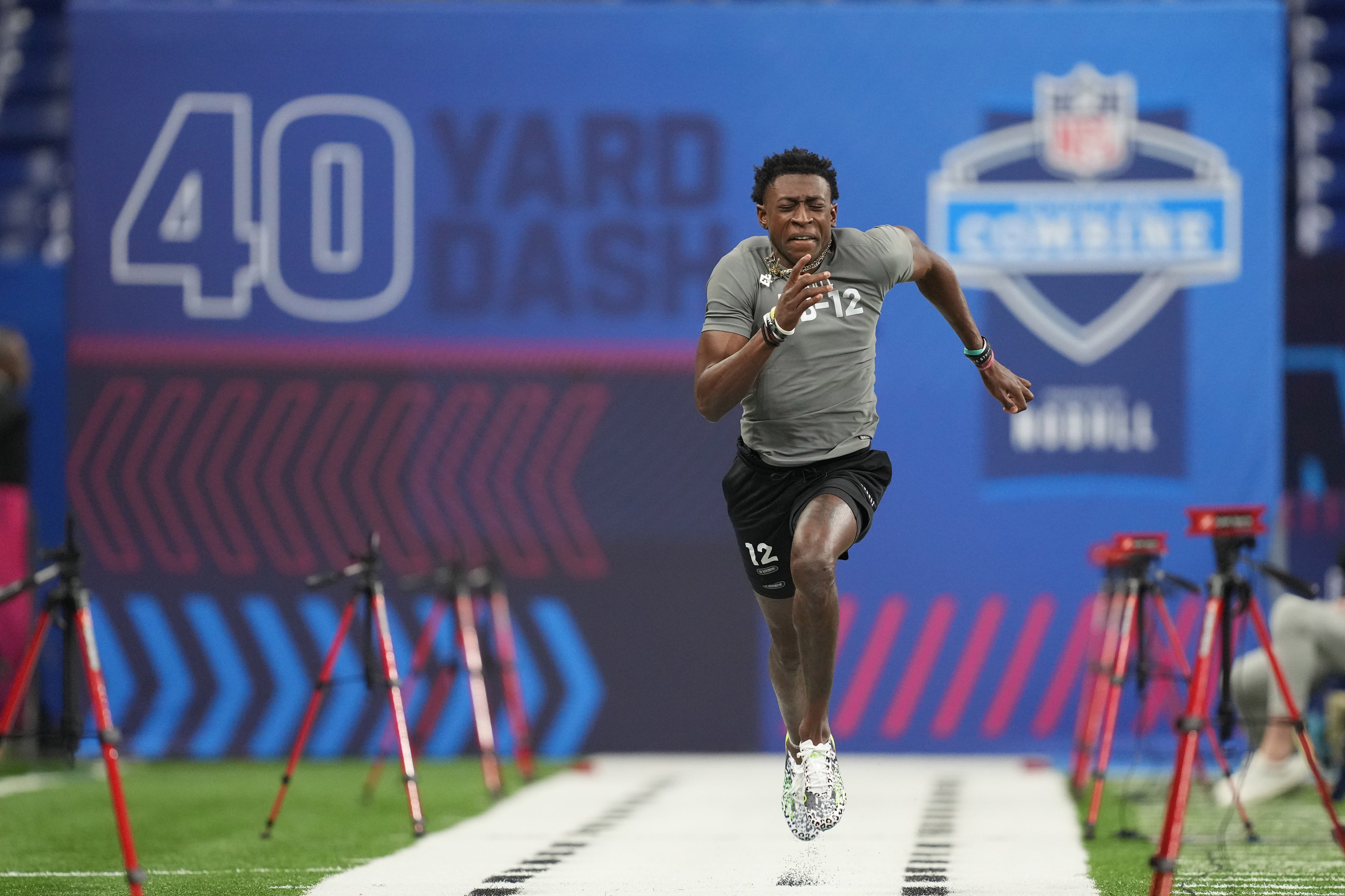 Mar 3, 2023; Indianapolis, IN, USA; Mississippi State defensive back Emmanuel Forbes (DB12) participates in drills at Lucas Oil Stadium. Mandatory Credit: Kirby Lee-USA TODAY Sports