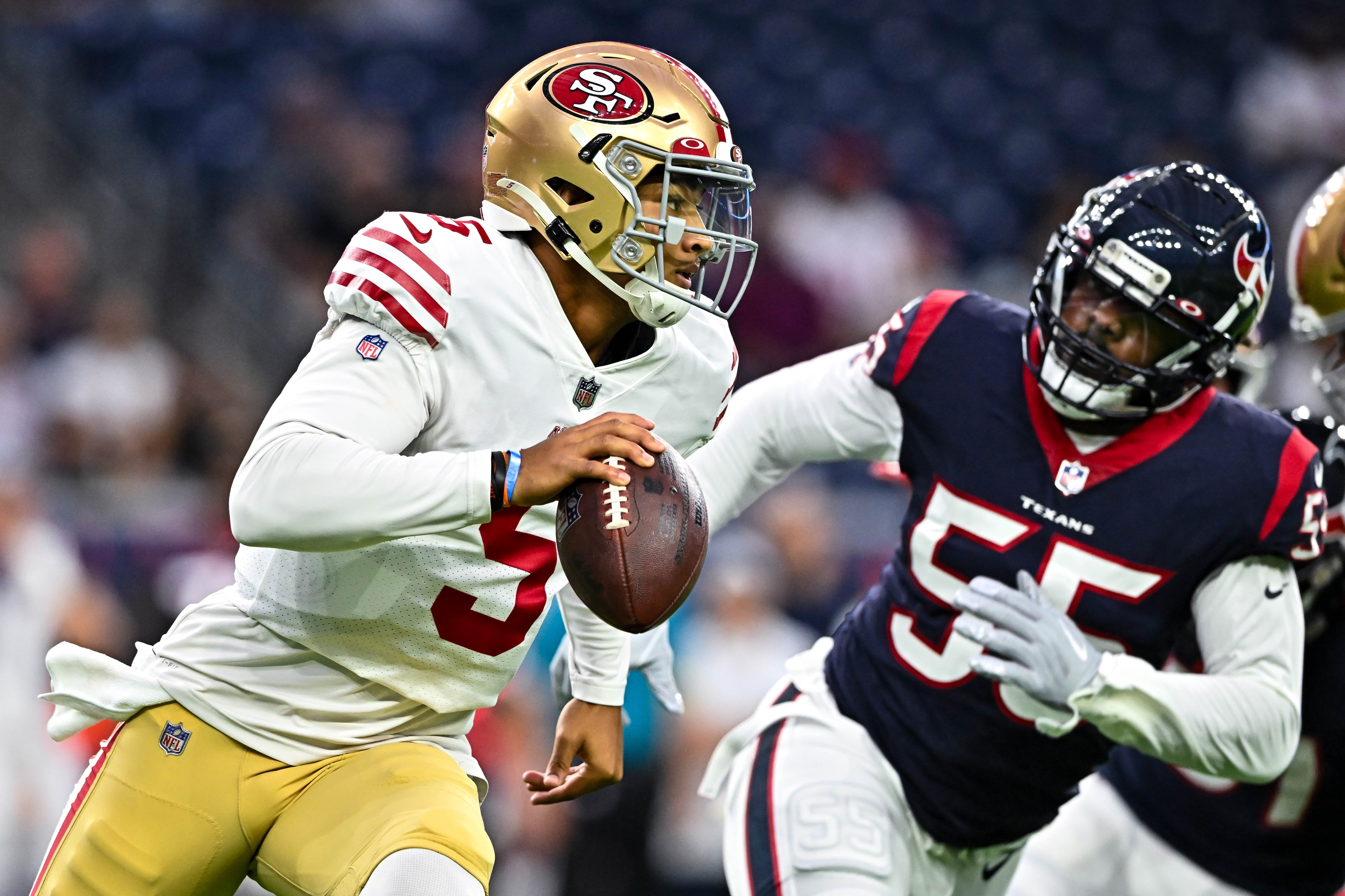 Aug 25, 2022; Houston, Texas, USA; San Francisco 49ers quarterback Trey Lance (5) runs the ball during the first quarter against the Houston Texans at NRG Stadium.