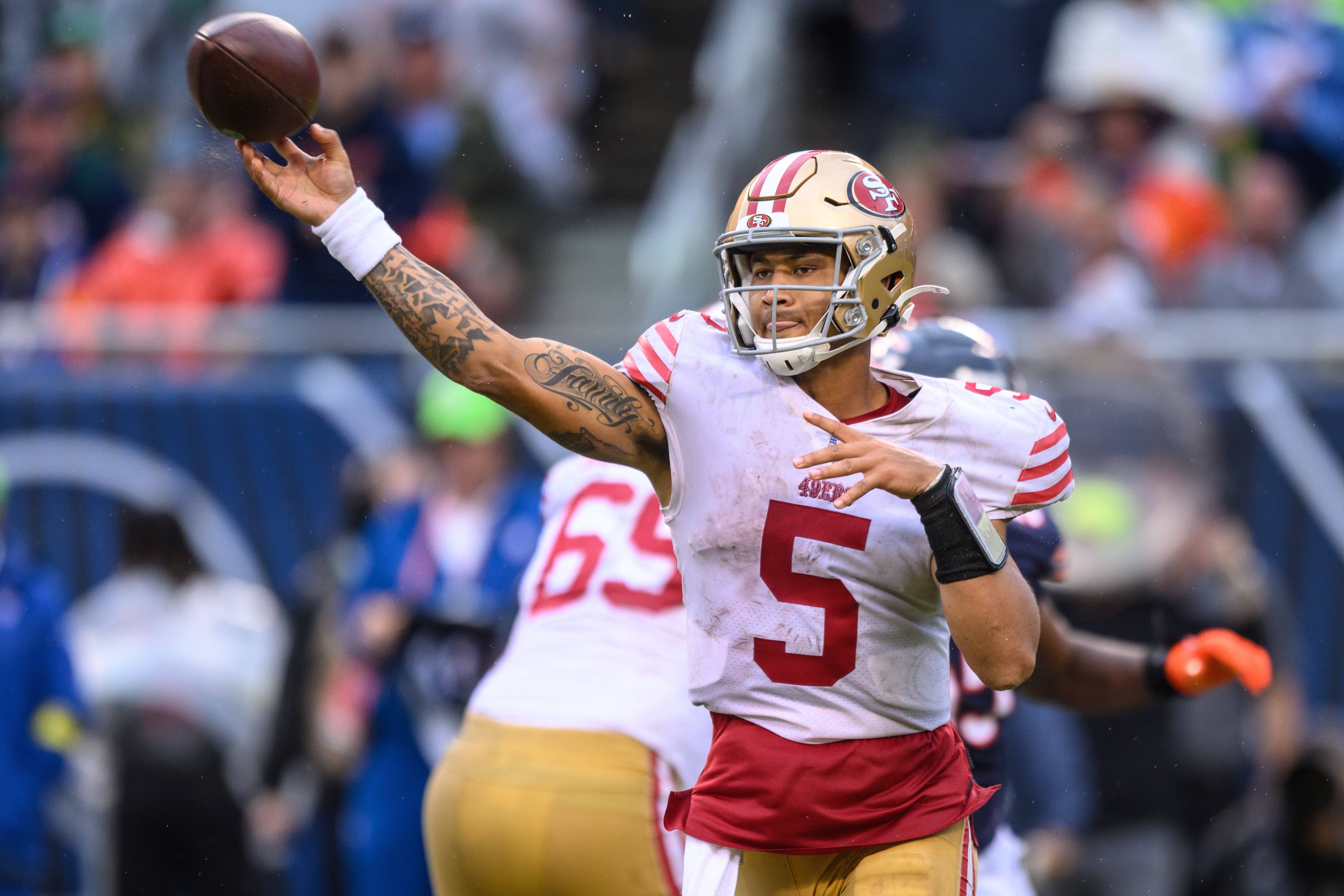 Sep 11, 2022; Chicago, Illinois, USA; San Francisco 49ers quarterback Trey Lance (5) passes the ball in the fourth quarter against the Chicago Bears at Soldier Field.