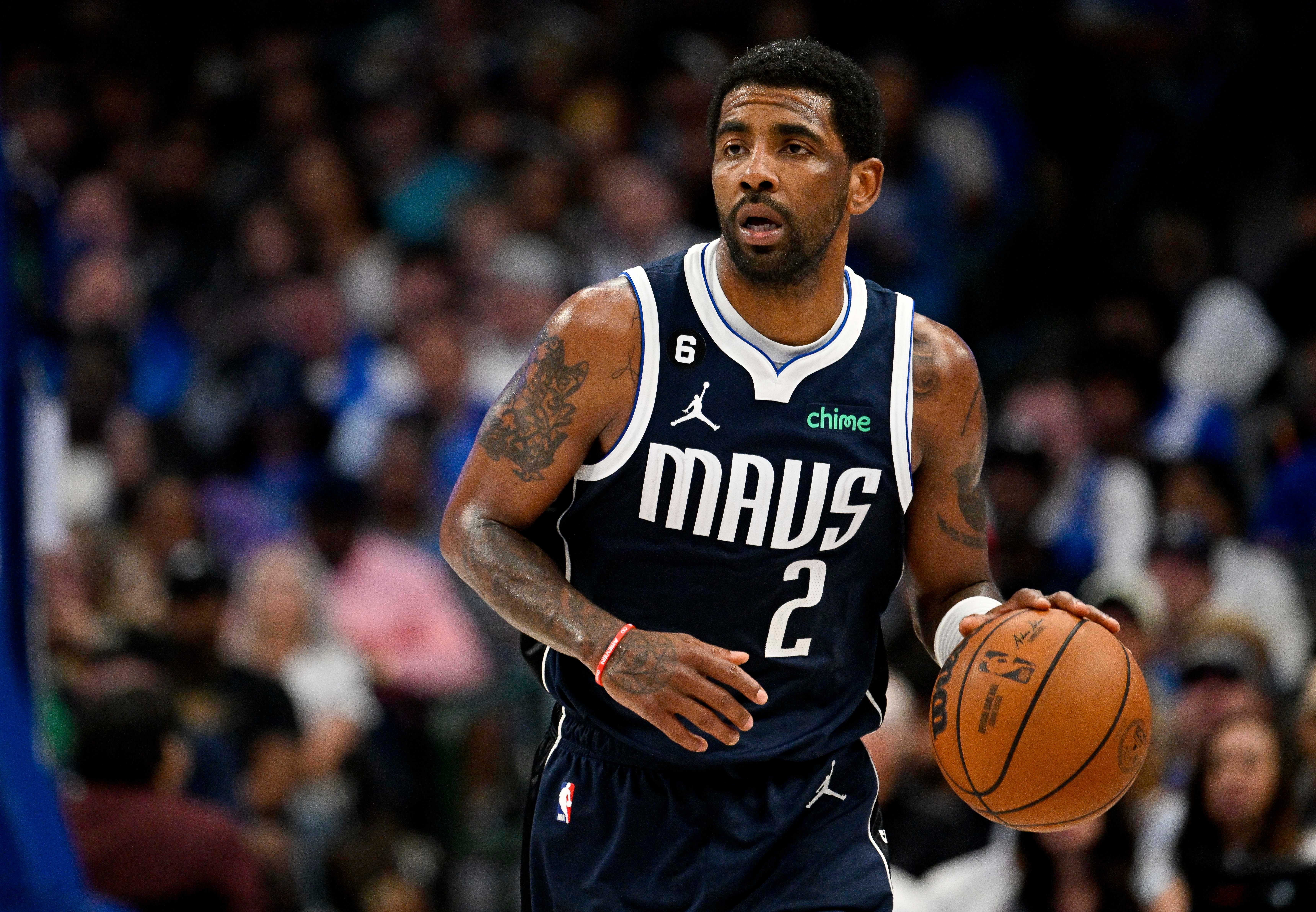 Mar 5, 2023; Dallas, Texas, USA; Dallas Mavericks guard Kyrie Irving (2) in action during the game between the Dallas Mavericks and the Phoenix Suns at the American Airlines Center.