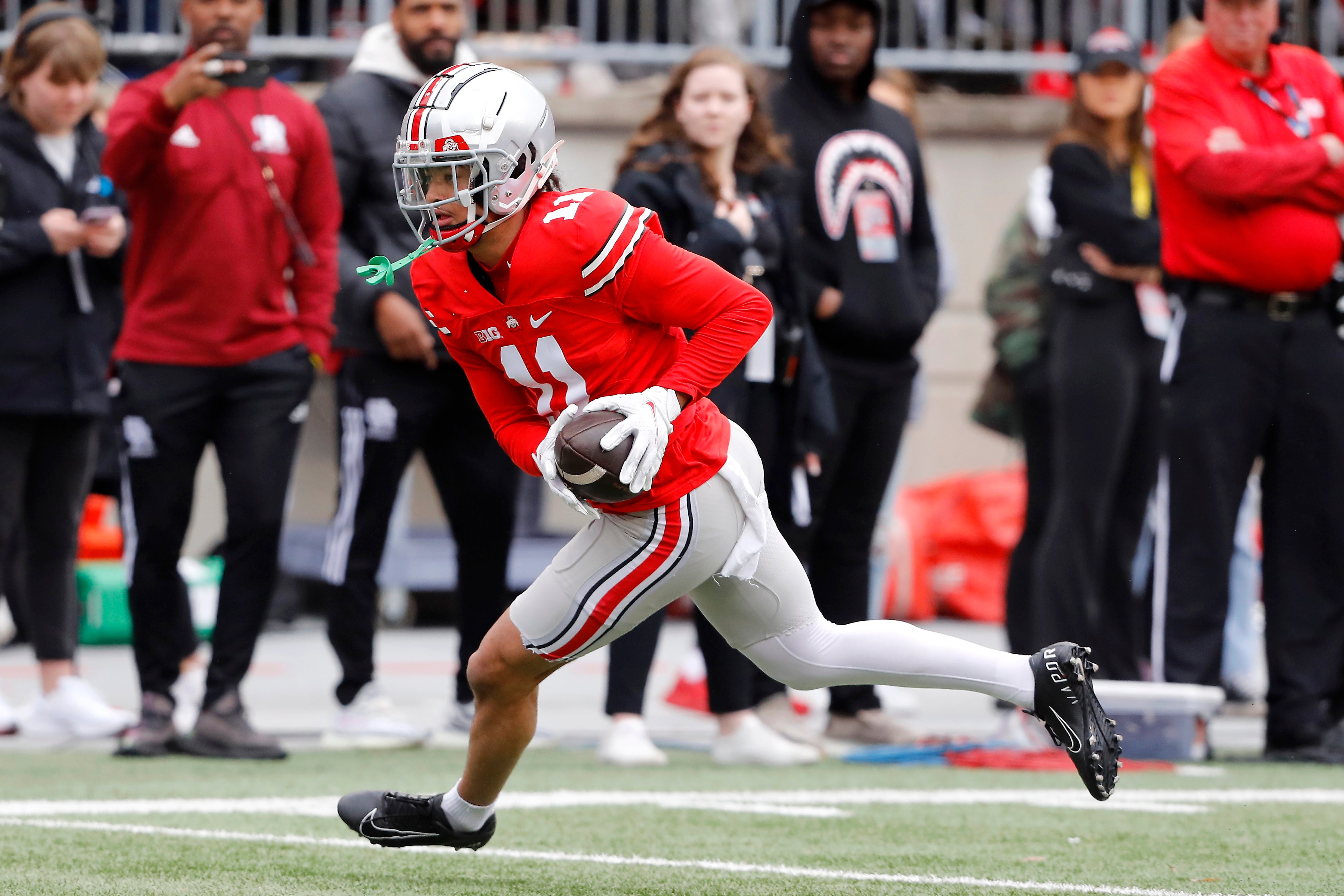 Apr 16, 2022; Columbus, Ohio, USA; Ohio State Buckeyes Scarlett wide receiver Jaxon Smith-Njigba (11) with the touchdown during the Annual Scarlett and Gray Spring game at Ohio Stadium.