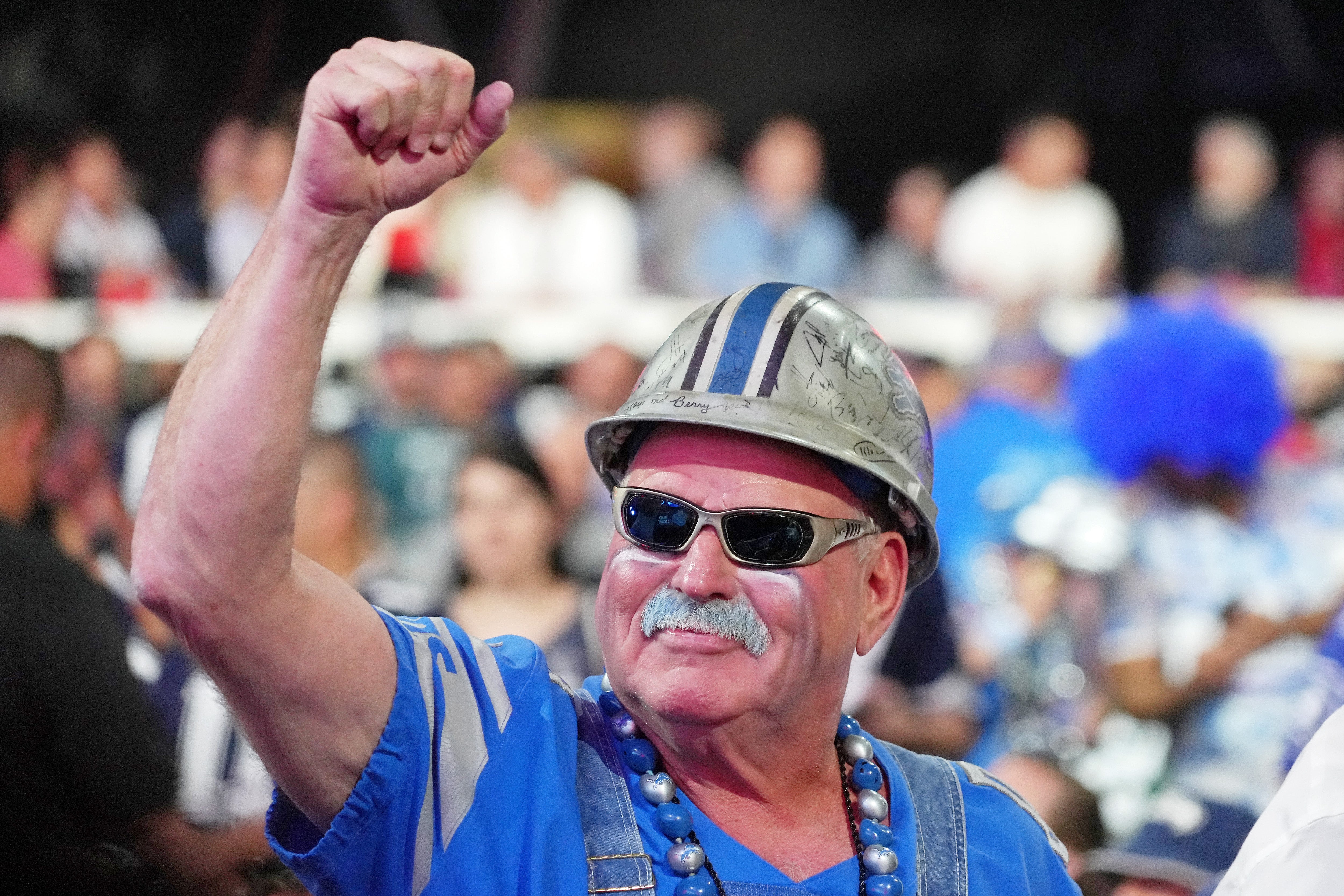 Apr 28, 2022; Las Vegas, NV, USA; A Detroit Lions fan gestures during the first round of the 2022 NFL Draft at the NFL Draft Theater. Mandatory Credit: Kirby Lee-USA TODAY Sports