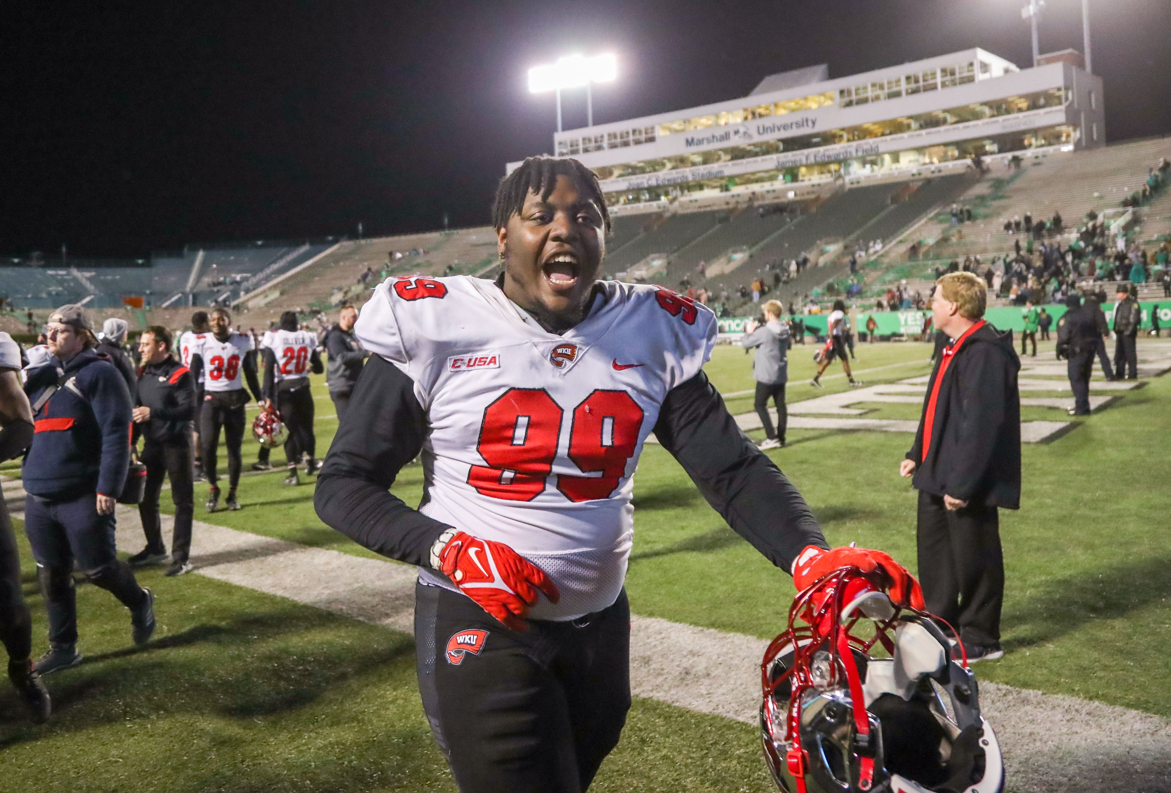 Nov 27, 2021; Huntington, West Virginia, USA; Western Kentucky Hilltoppers defensive tackle Brodric Martin (99) celebrates after defeating the Marshall Thundering Herd at Joan C. Edwards Stadium. Mandatory Credit: Ben Queen-USA TODAY Sports